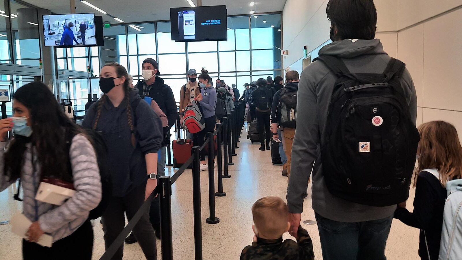 salt lake city international airport security line, airport experiencing delays due to weather toda...