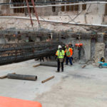 During the jack and bore seismic strengthening process, pipes are reinforced with steel and filled with structural concrete to act as supporting beams beneath the existing temple foundation, Salt Lake City, December 2021.