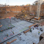 Workers lay a steel mat in preparation for the largest concrete pour of the Temple Square renovation project, Salt Lake City, December 1, 2021.