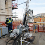 One of two drills positioned on the roof of the Salt Lake Temple used to drill inside the tower and wall columns where post-tension cables are inserted and anchored into the foundation (80 feet or 24 meters below), Salt Lake City, December 2021.