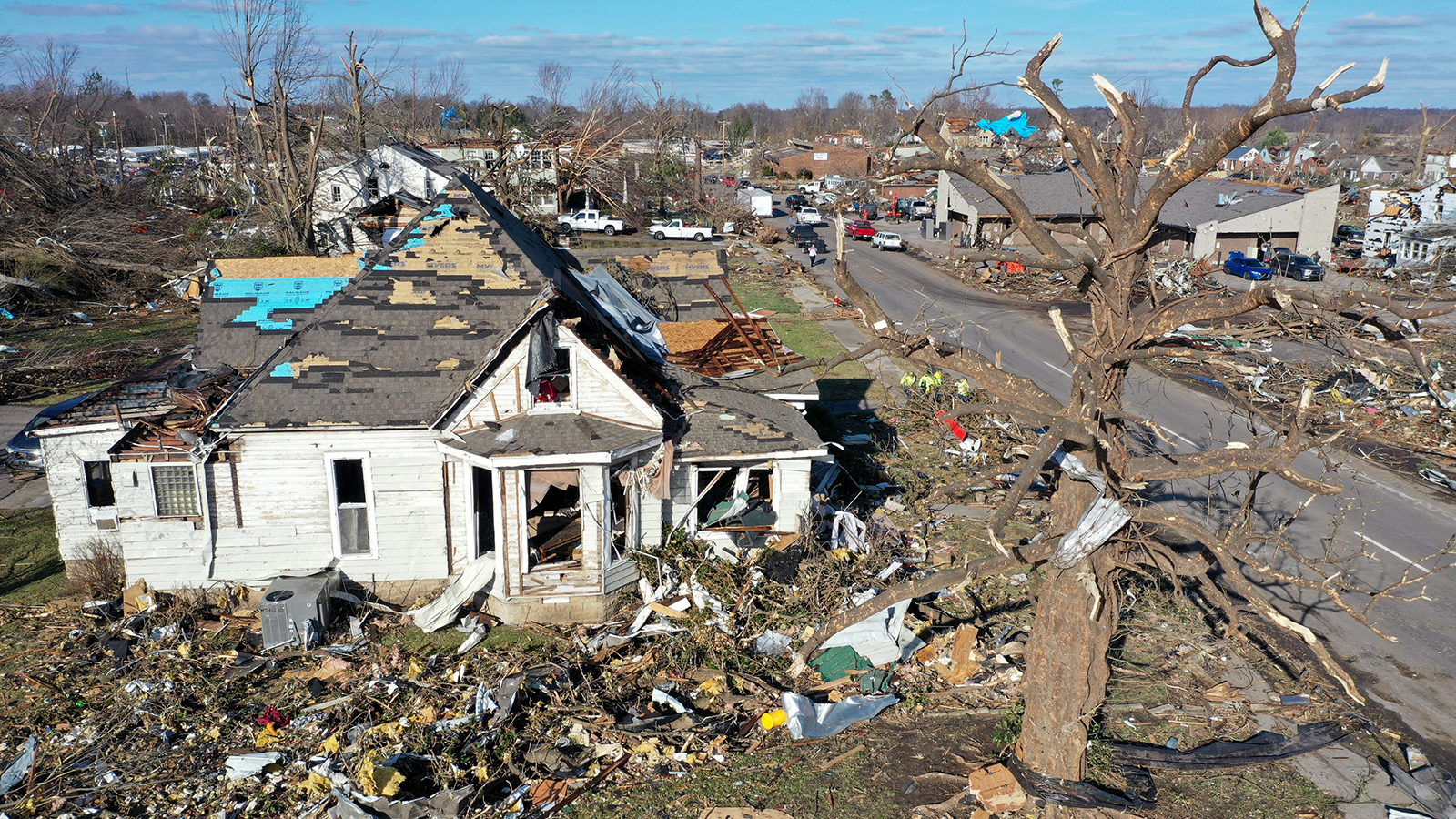 MAYFIELD, KENTUCKY - DECEMBER 11: In this aerial view, homes are badly destroyed after a tornado ri...