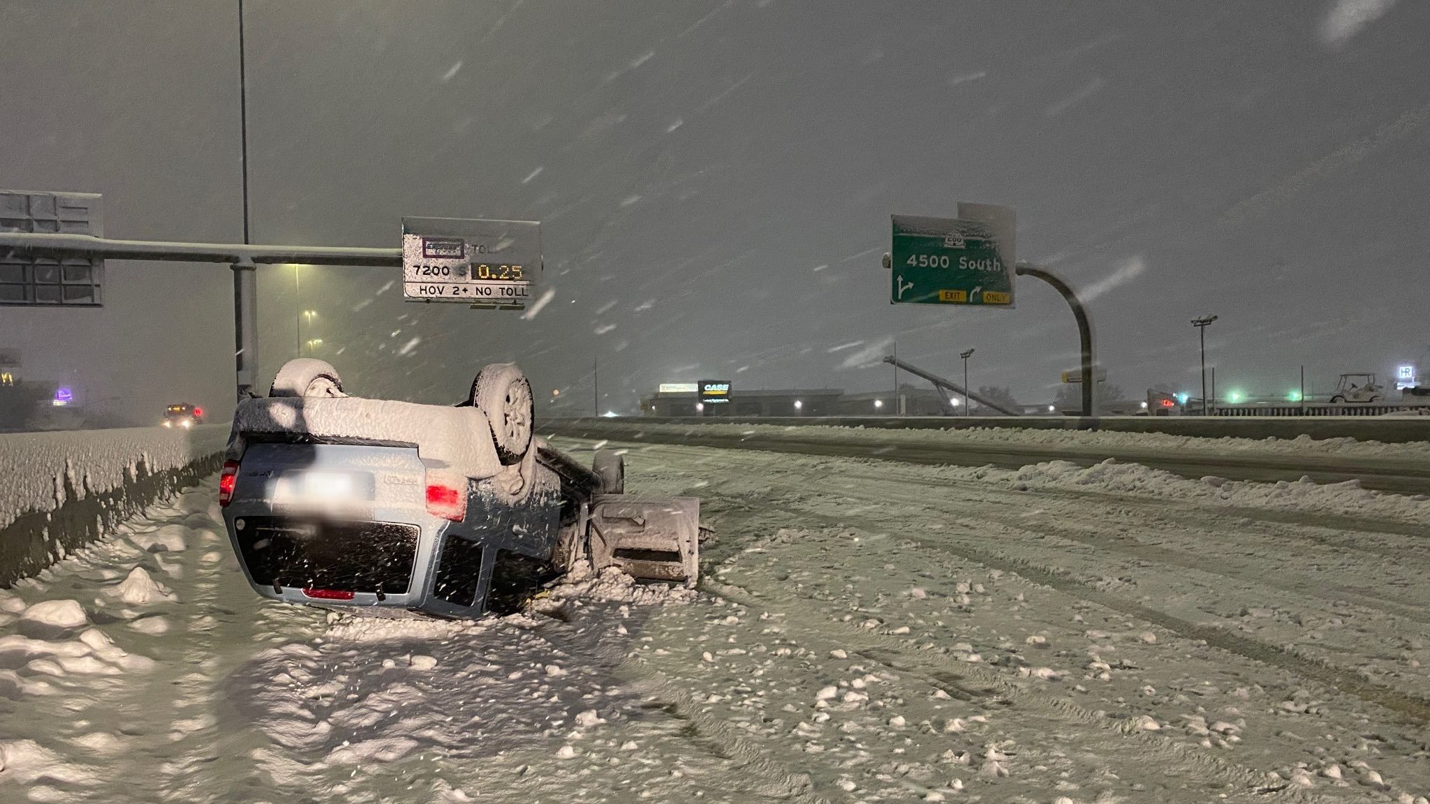 An overturned vehicle on southbound I-15 in Salt Lake City. The UHP says there were no injuries in ...