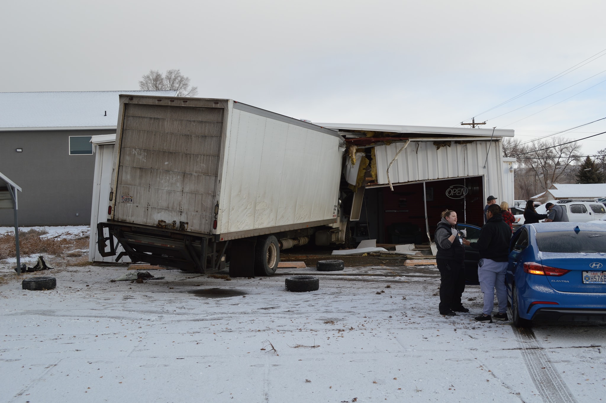 A truck slid off the road Tuesday morning and crashed into a building in Duchesne City Tuesday morn...