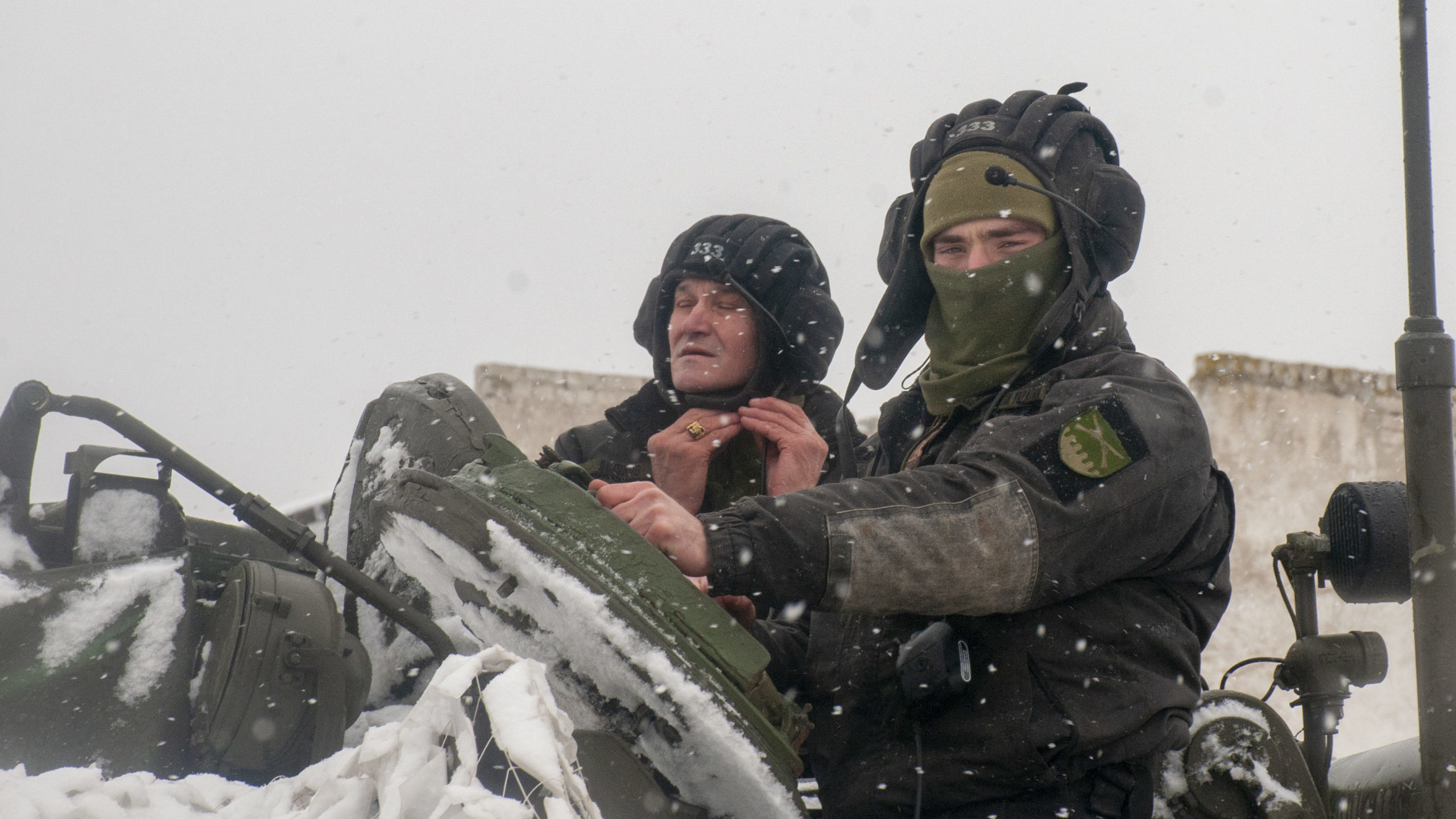 Ukrainian soldiers examine their tank at a military unit close to Kharkiv, Ukraine, Monday, Jan. 31...