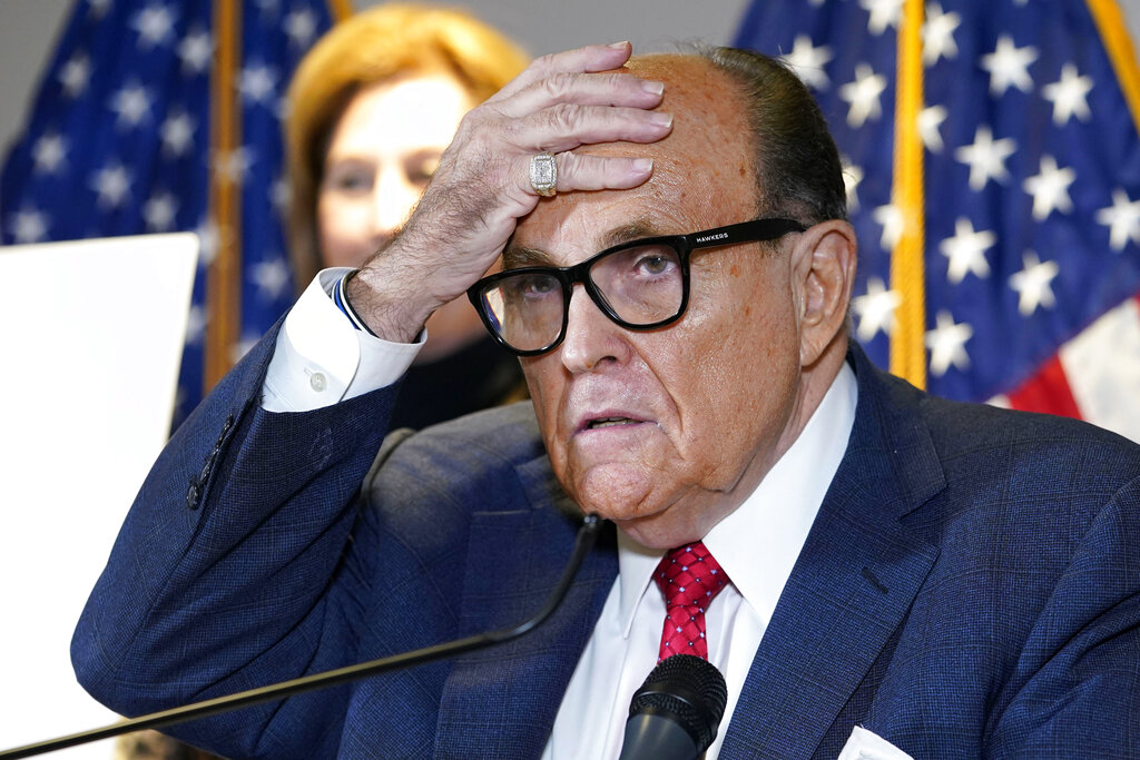 FILE - In this Nov. 19, 2020, file photo, former New York Mayor Rudy Giuliani, who was a lawyer for...