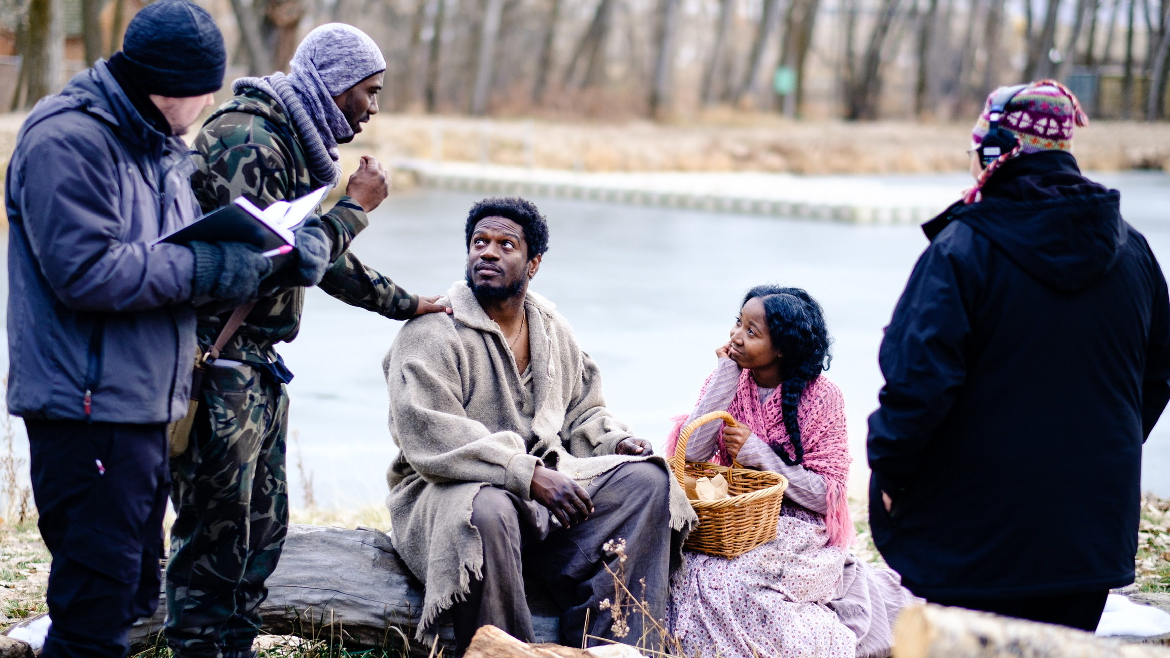 Actors and production crew looks to director Mauli Bonner for direction on the set of "His Name is ...