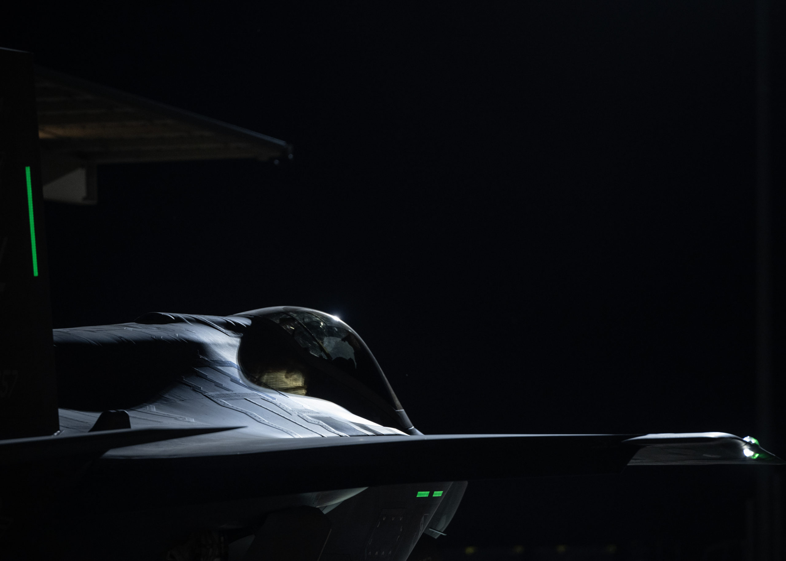A crew chief from the 388th Fighter Wing marshalls an F-35A Lightning II as they launch for deploym...