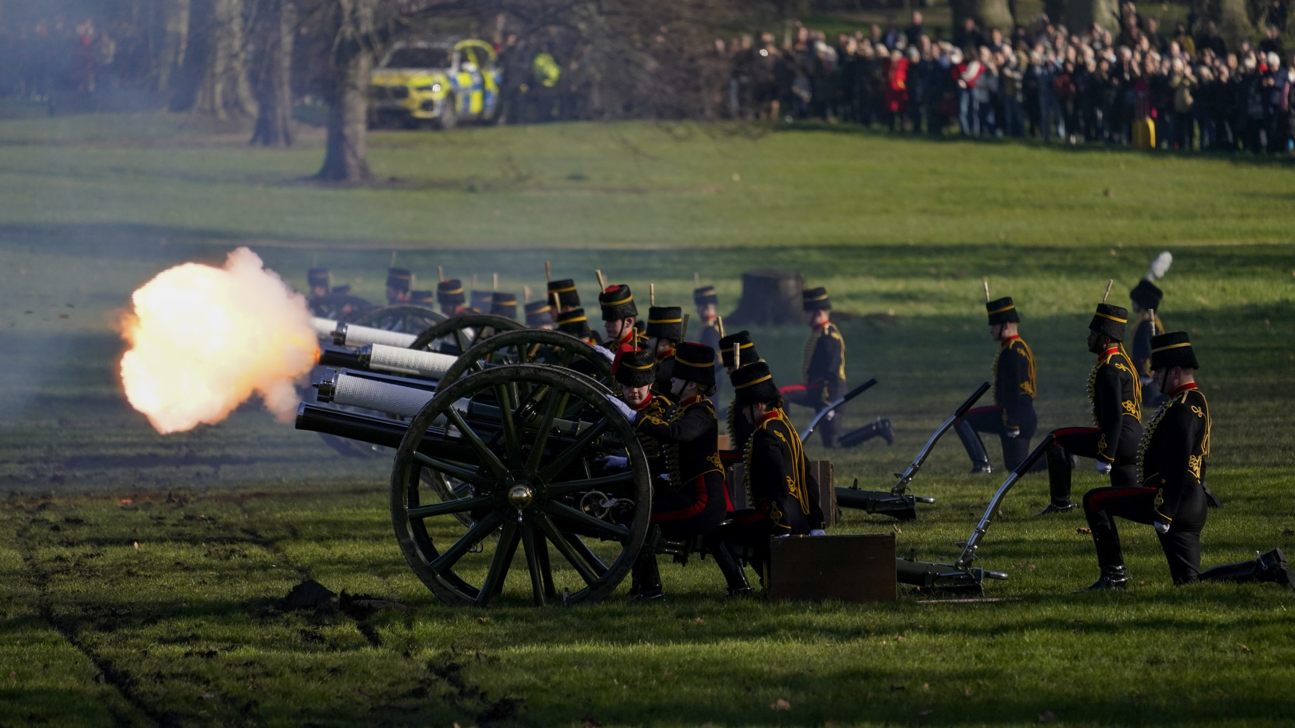 Fire shrouds the scene as The King's Troop Royal Horse Artillery fire gun salutes to mark the 70th ...