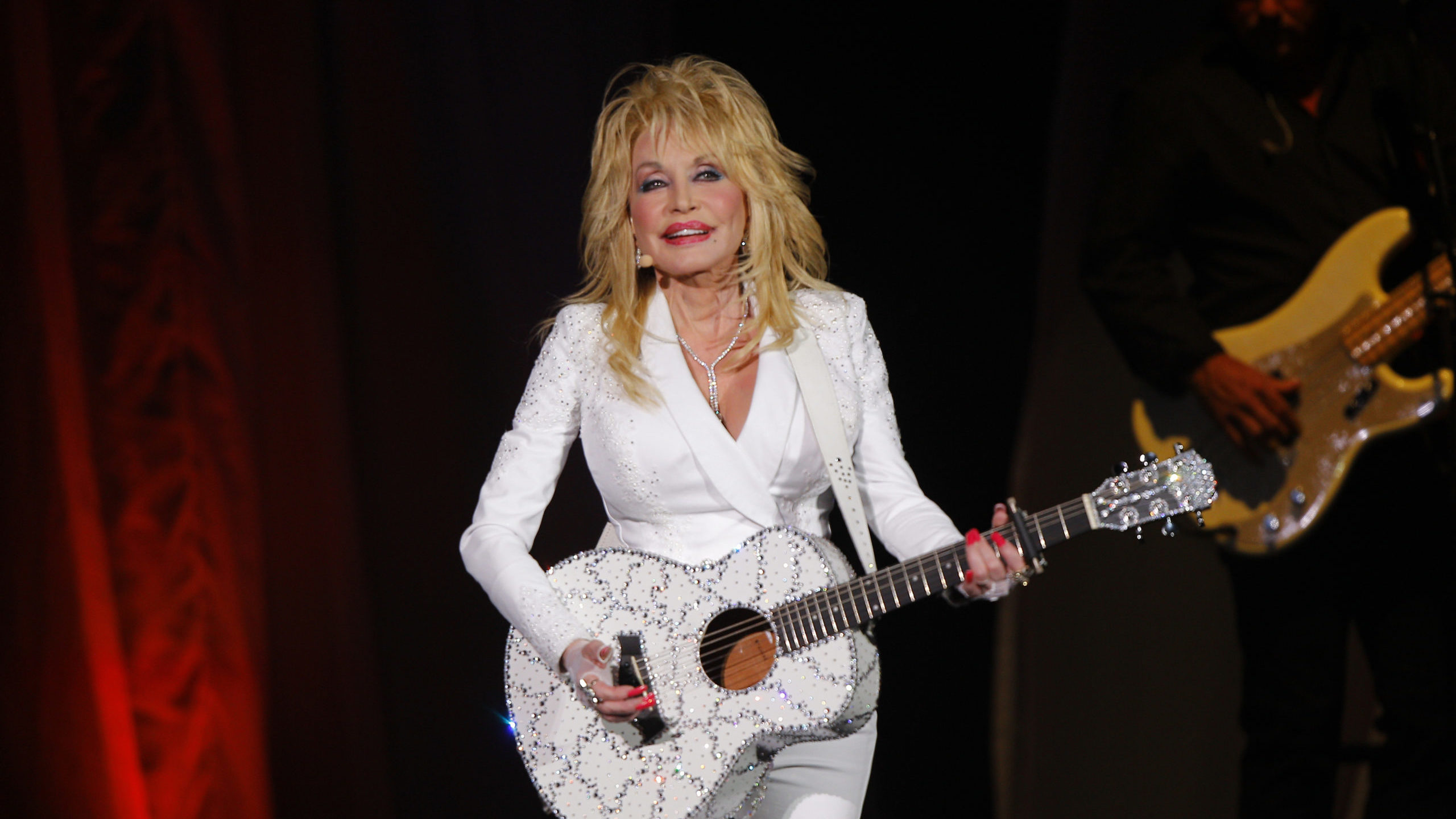 FILE - Dolly Parton performs in concert on July 31, 2015, in Nashville, Tenn. Parton is among this ...