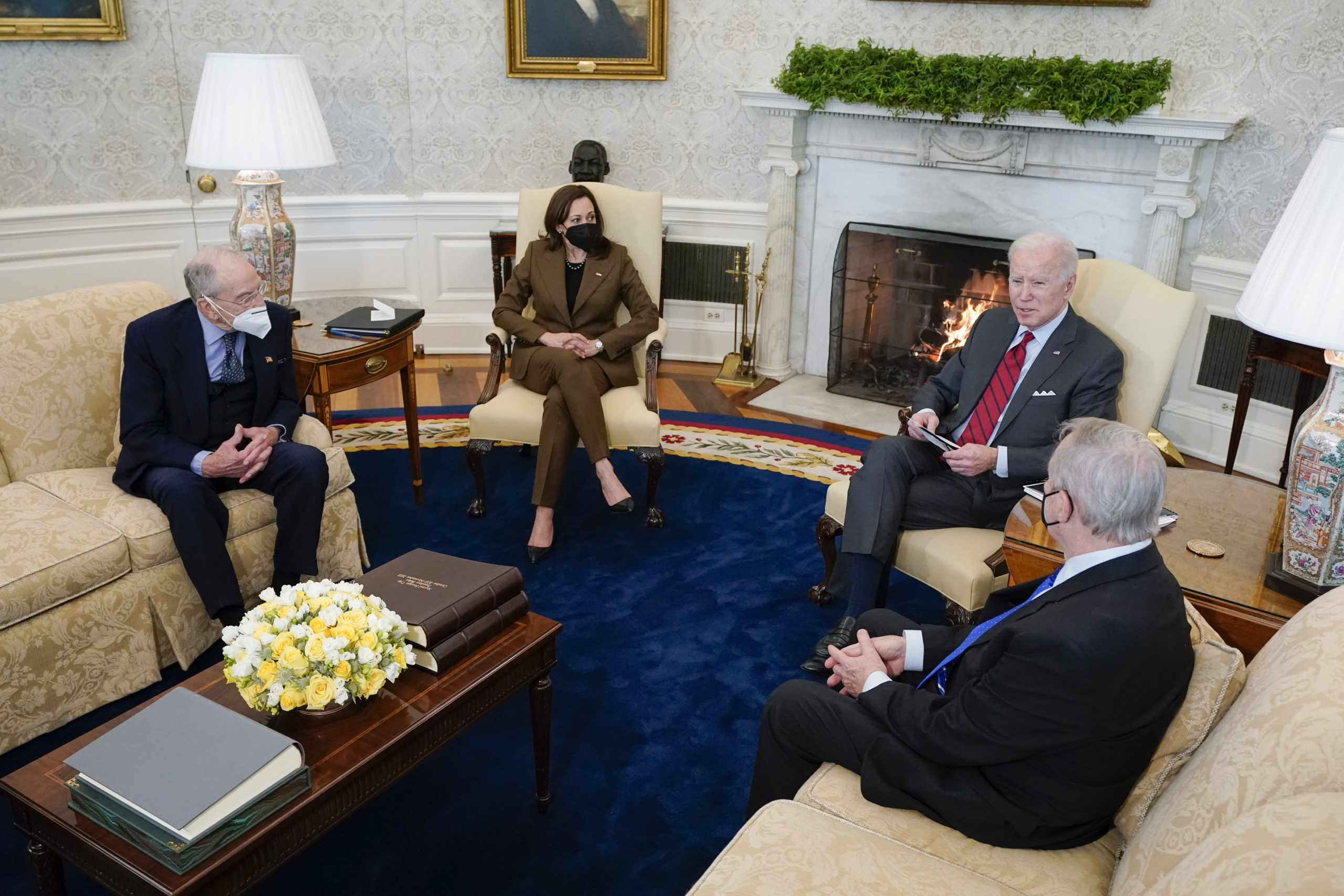 President Joe Biden and Vice President Kamala Harris meet with Sen. Dick Durbin, D-Ill., right, cha...