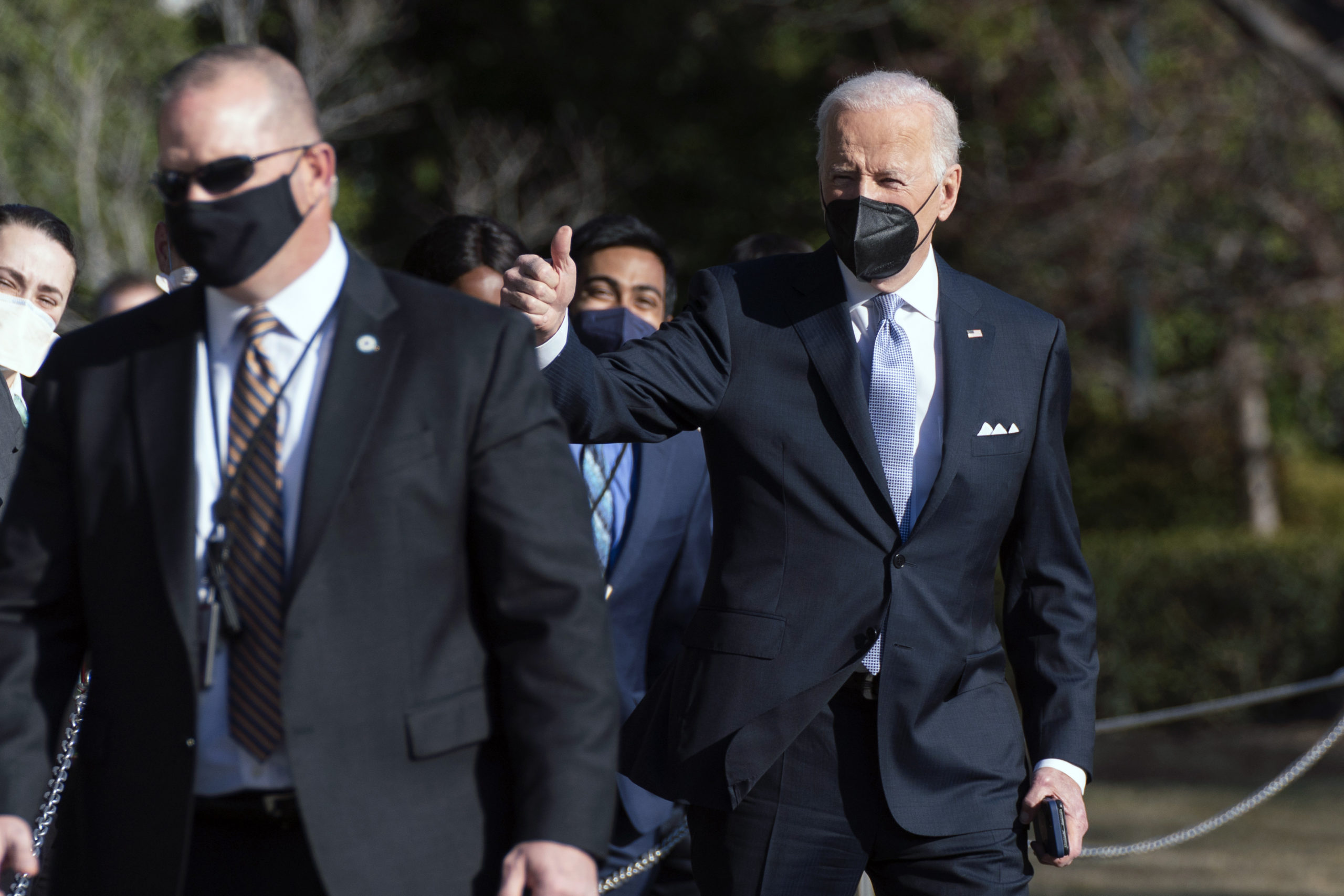 President Joe Biden gives a thumbs up as he walks to board Marine One on the South Lawn of the Whit...