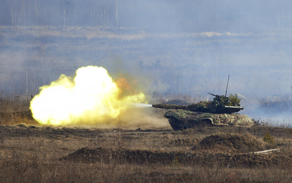 Ukrainian troops take part in a military drill outside the city of Rivne, northern Ukraine, Wednesd...