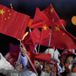 Athletes from China march into the stadium during the closing ceremony of the 2022 Winter Olympics, Sunday, Feb. 20, 2022, in Beijing. (AP Photo/Jae C. Hong)