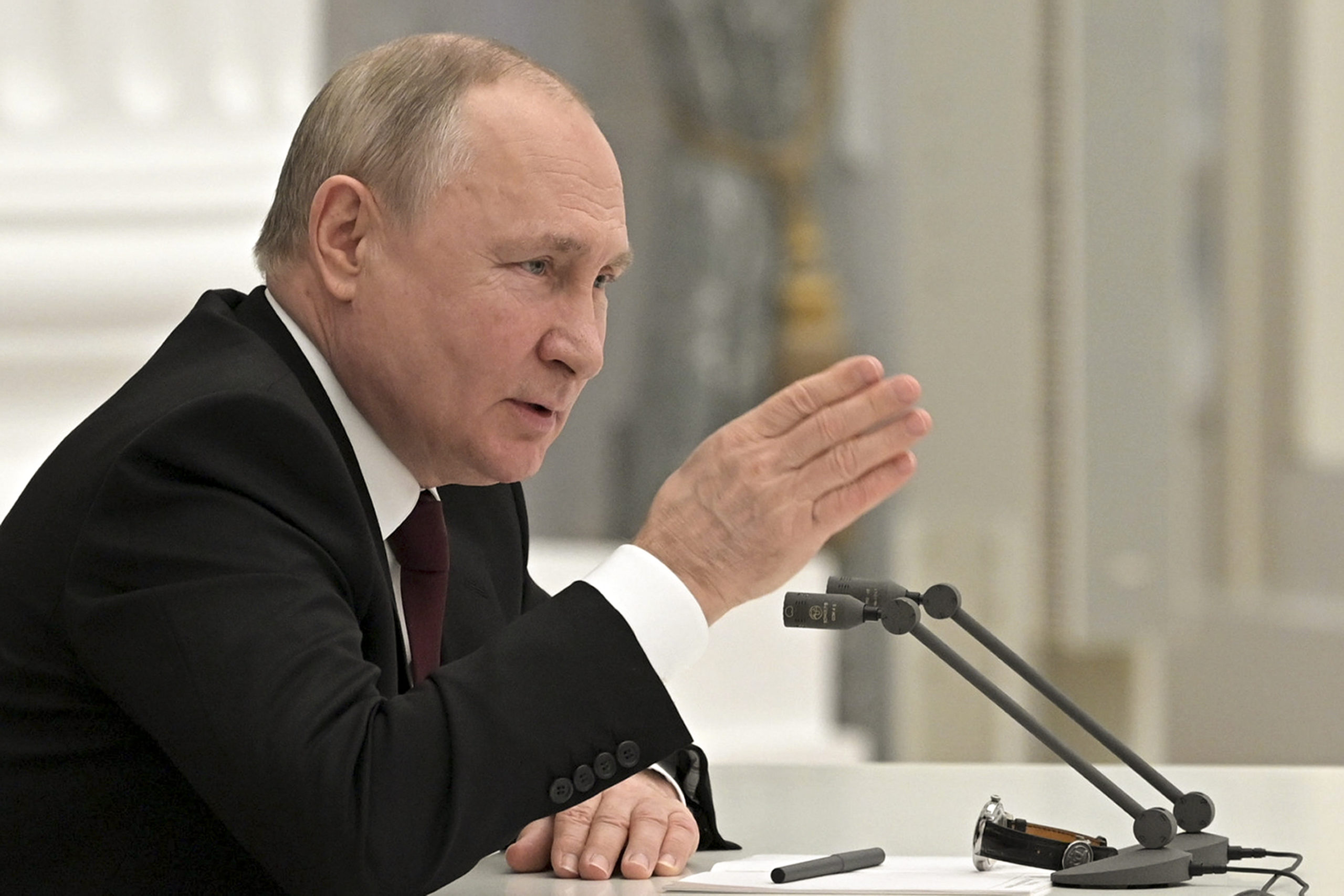 Russian President Vladimir Putin speaks during a Security Council meeting in the Kremlin in Moscow,...