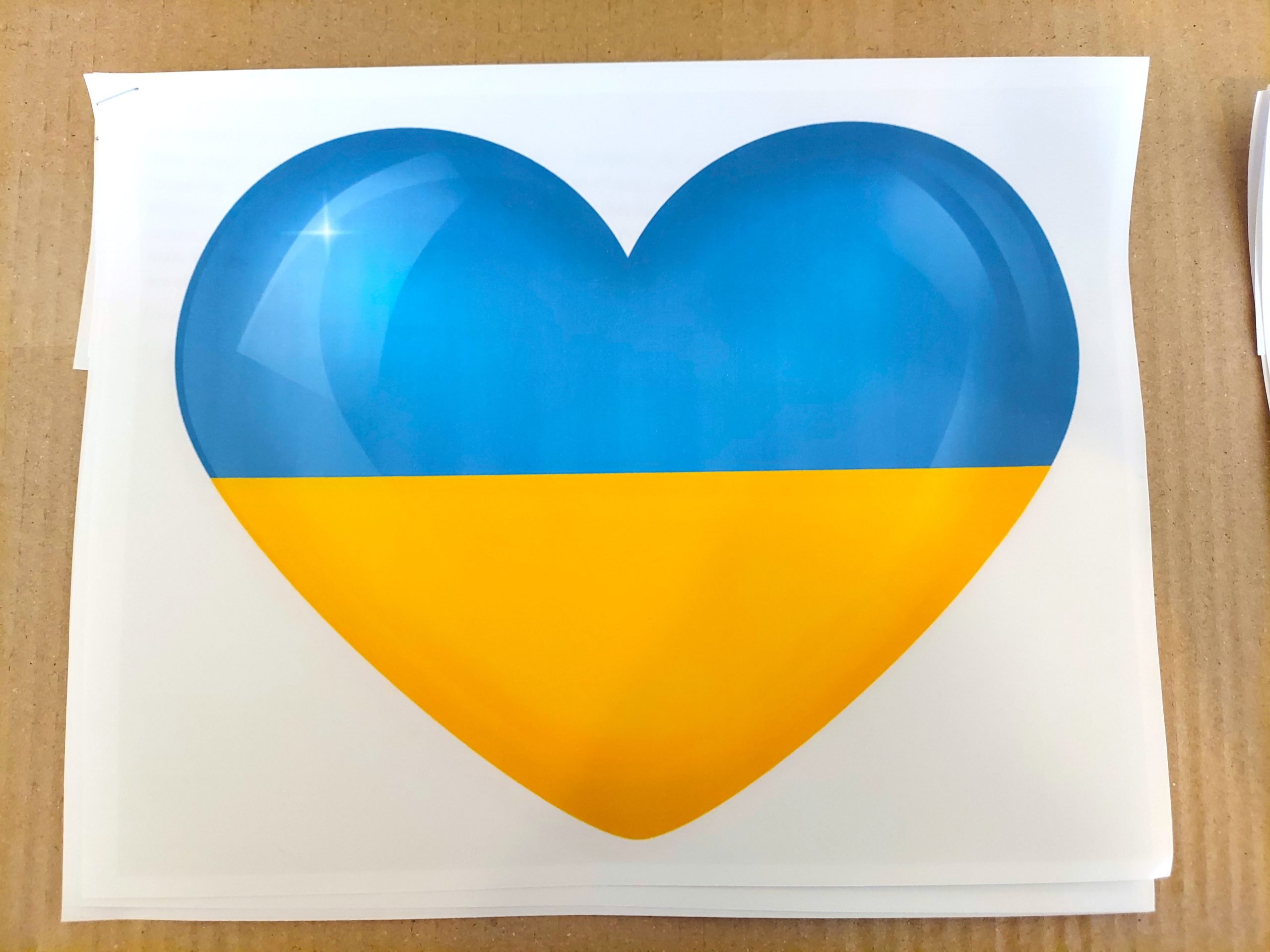 A Murray family is showing its support for Ukraine. The family is making hearts with the colors of ...