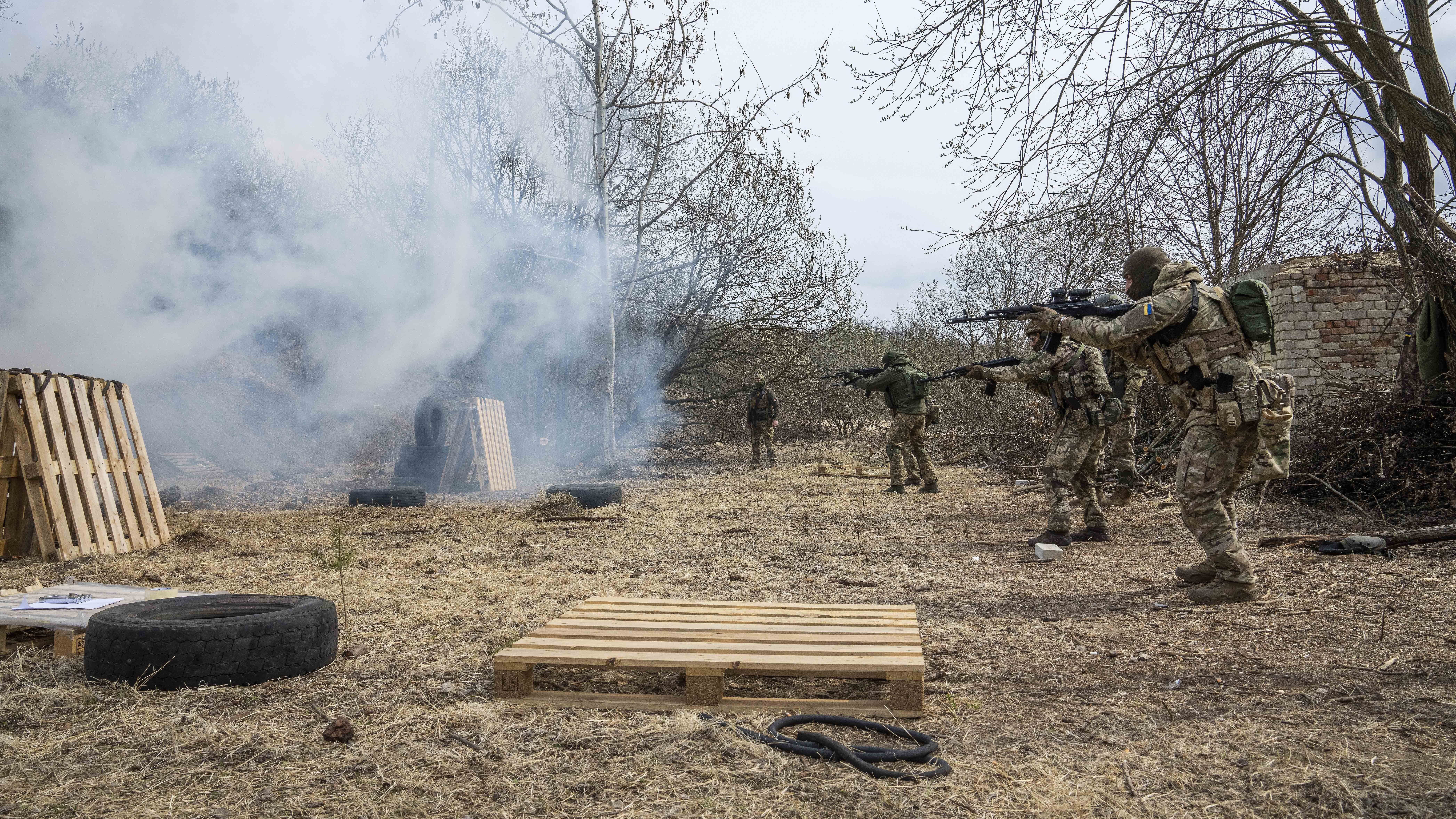 Ukrainian soldiers of the 103rd Separate Brigade of the Territorial Defense of the Armed Forces, fi...