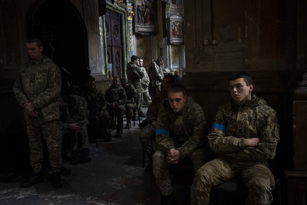 Military cadets attend a funeral ceremony for four of the Ukrainian military servicemen, who were k...
