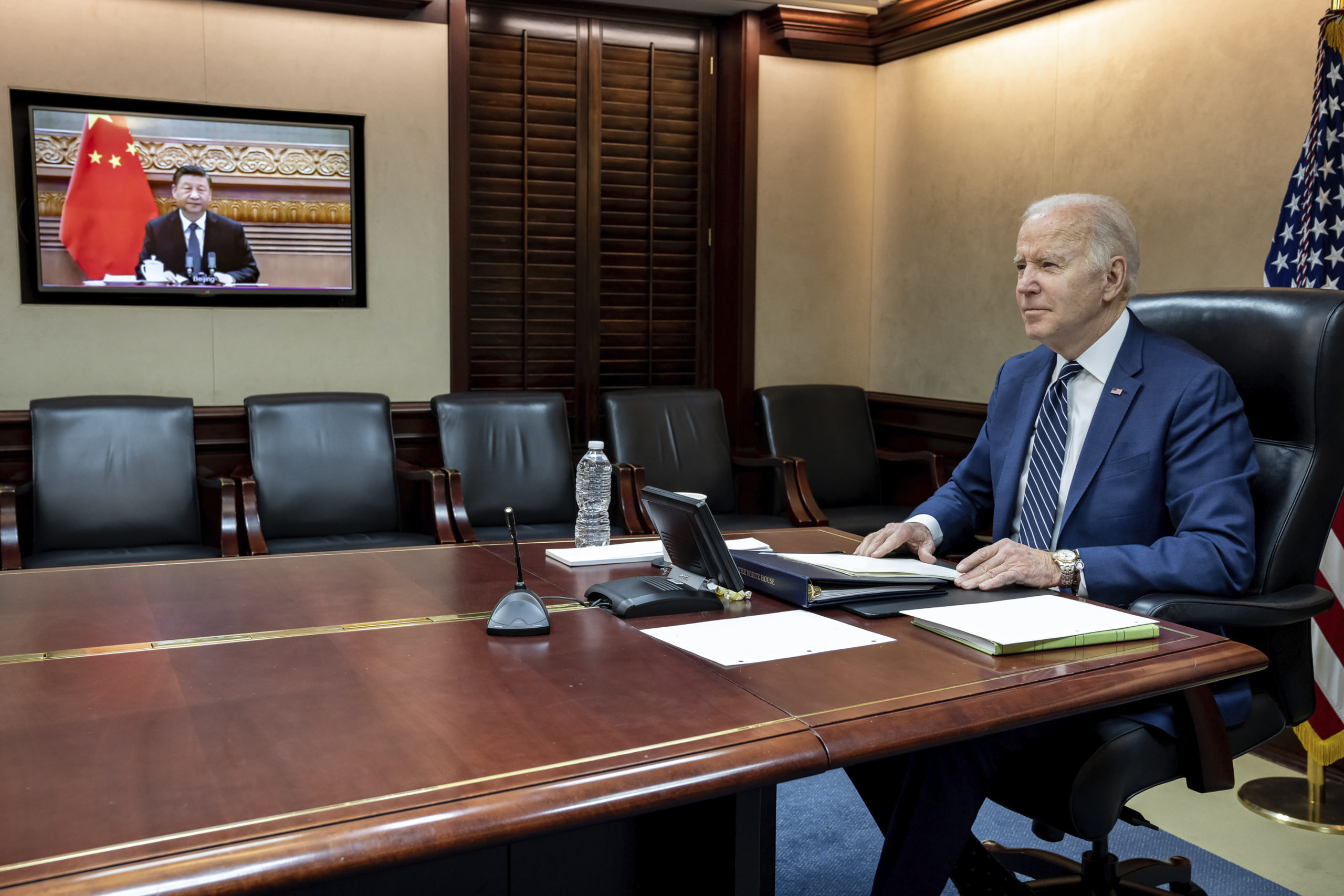 President Joe Biden meets virtually from the Situation Room at the White House with China’s Xi Ji...
