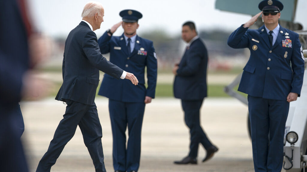 President Joe Biden walks to board Air Force One, Thursday, April 21, 2022, at Andrews Air Force Ba...