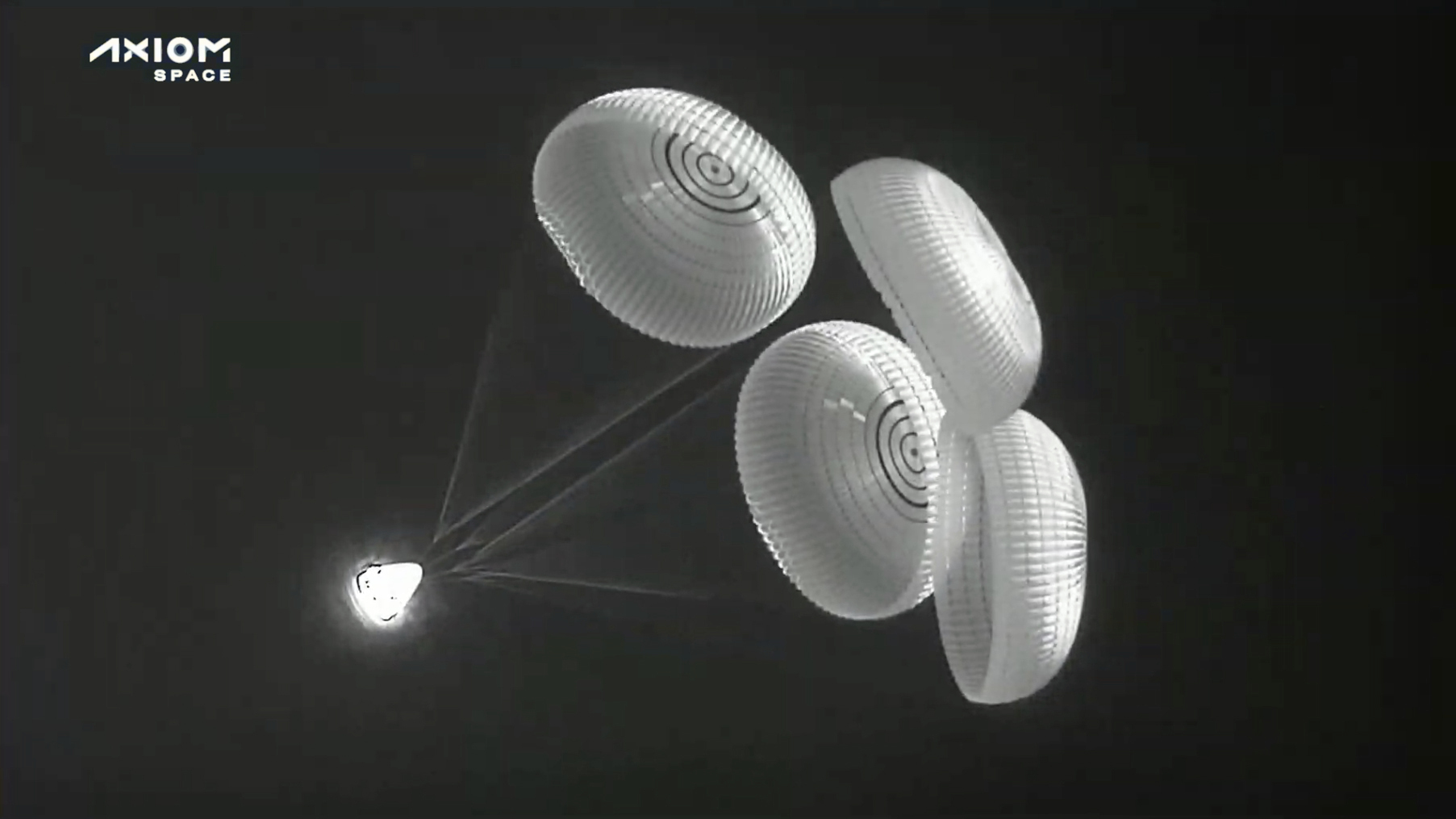 In this image from infrared video provided by SpaceX, the Dragon space capsule uses parachutes as i...