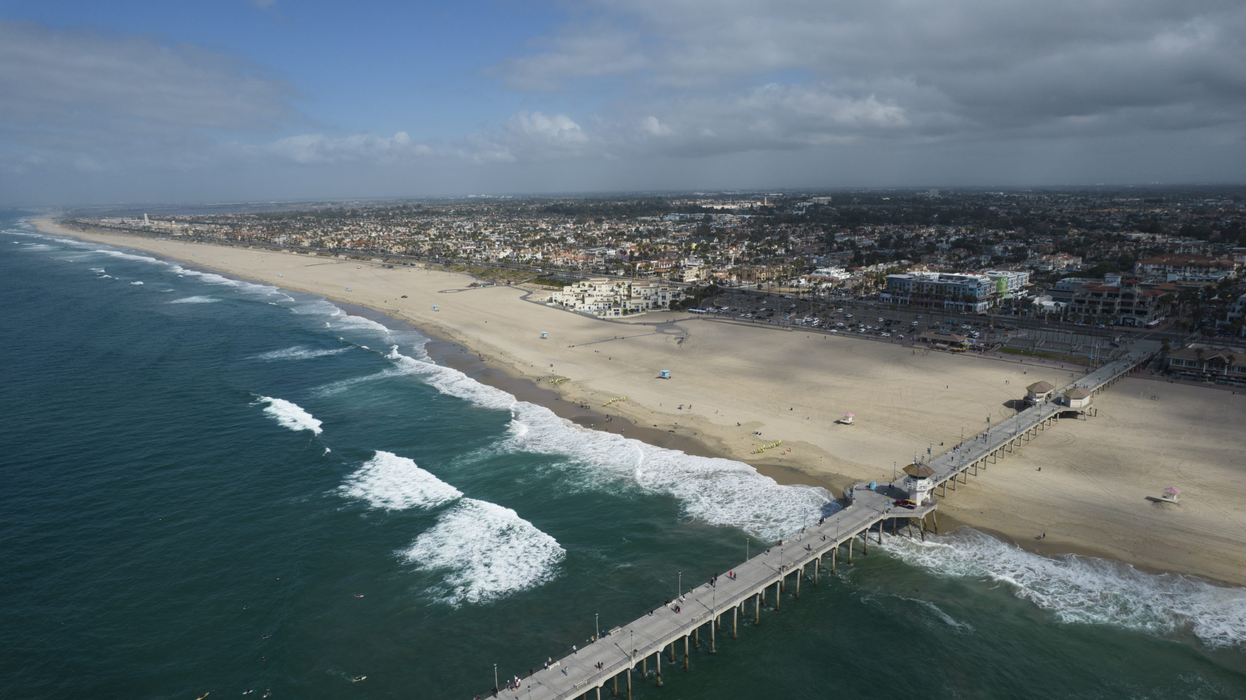 FILE - This aerial photo shows the pier and shoreline in Huntington Beach, Calif., on Oct. 11, 2021...