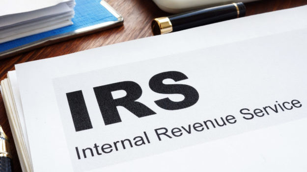 A paper reading IRS, internal revenue service is pictured...