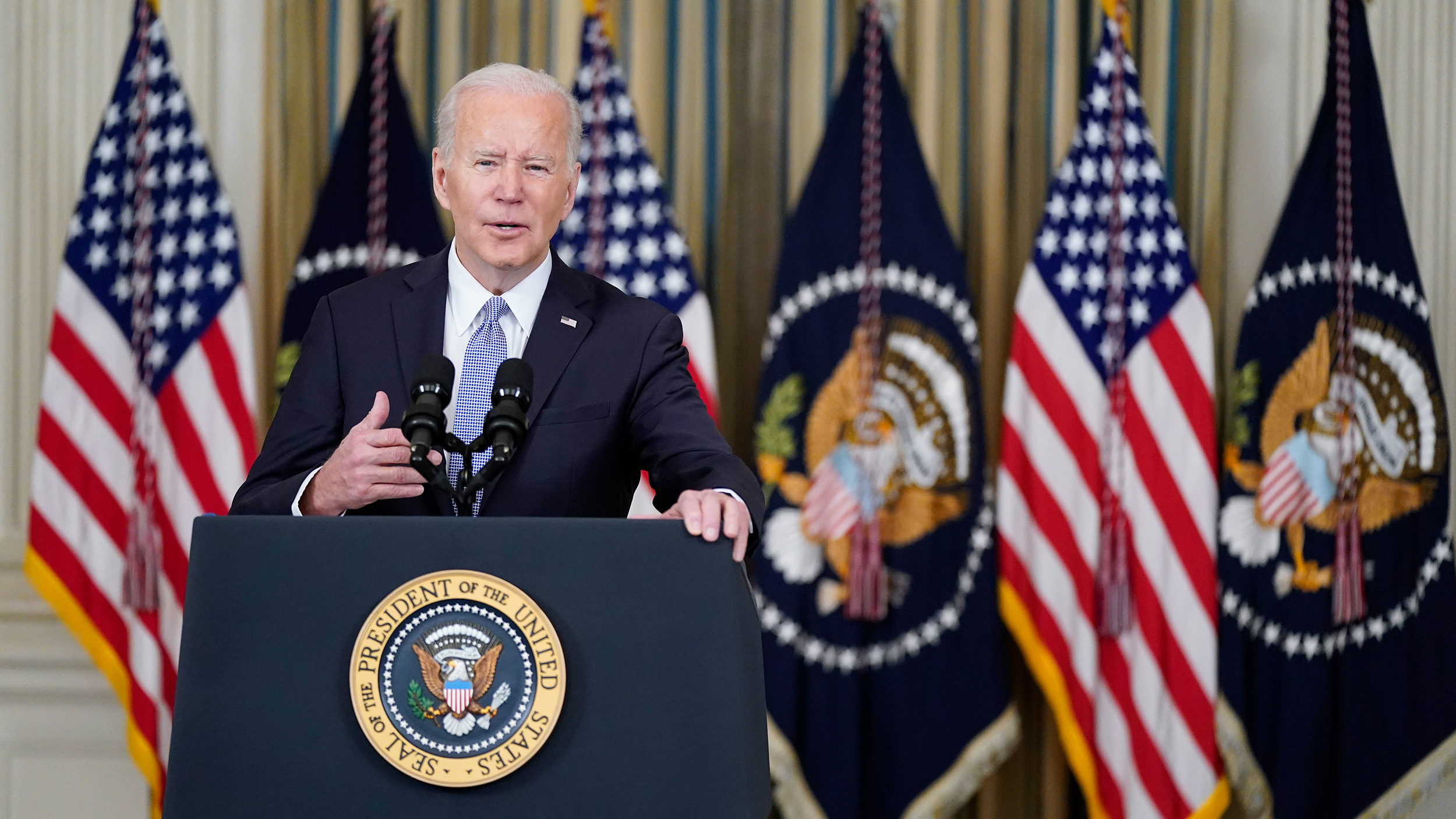President Joe Biden speaks about the March jobs report in the State Dining Room of the White House,...