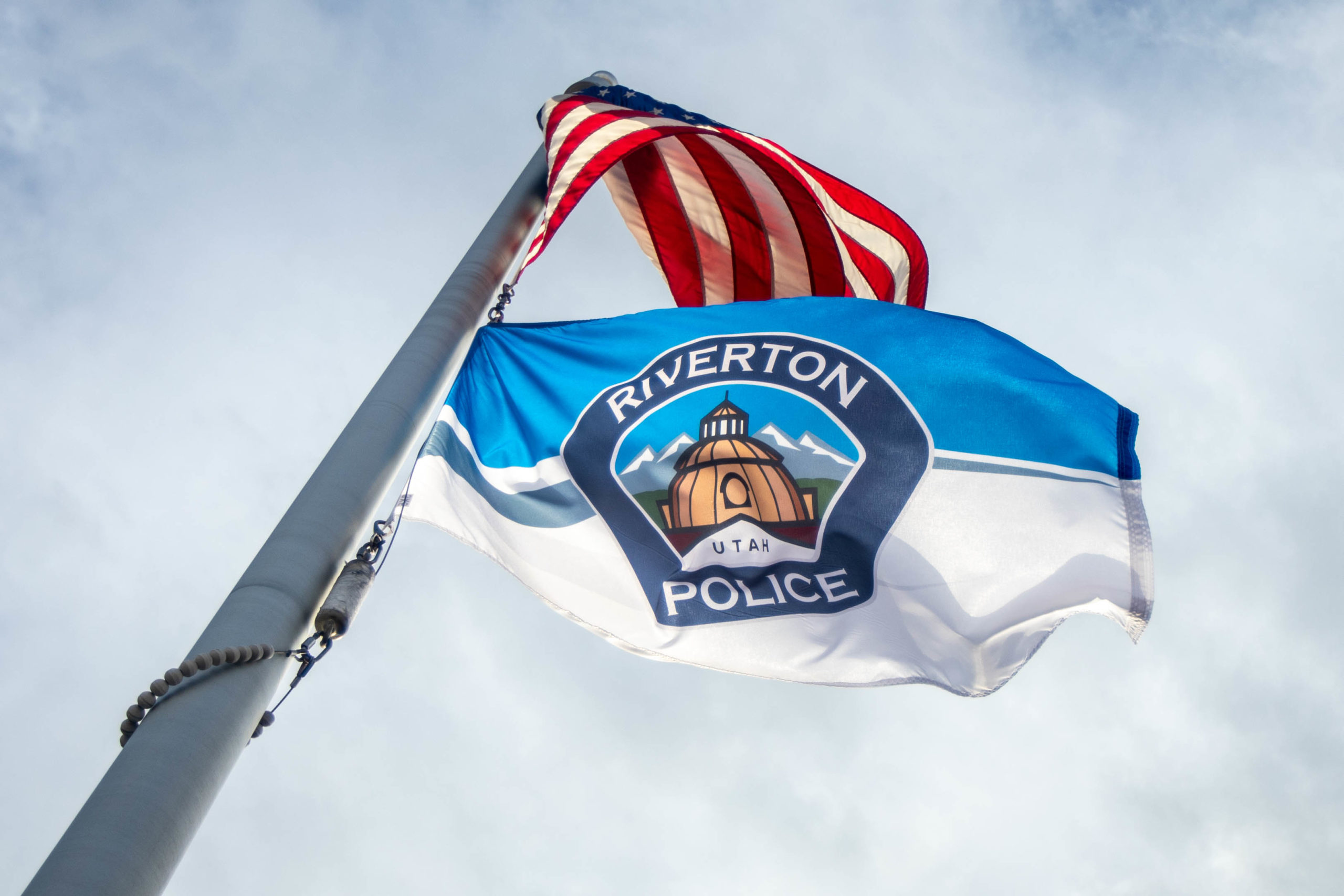 Flags fly outside of the Riverton Police Department in Riverton on Thursday Feb. 11, 2021. (Ali Bar...
