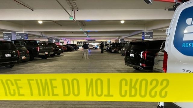 (Investigators sealing off a portion of the parking garage at Salt Lake International Airport, Apri...