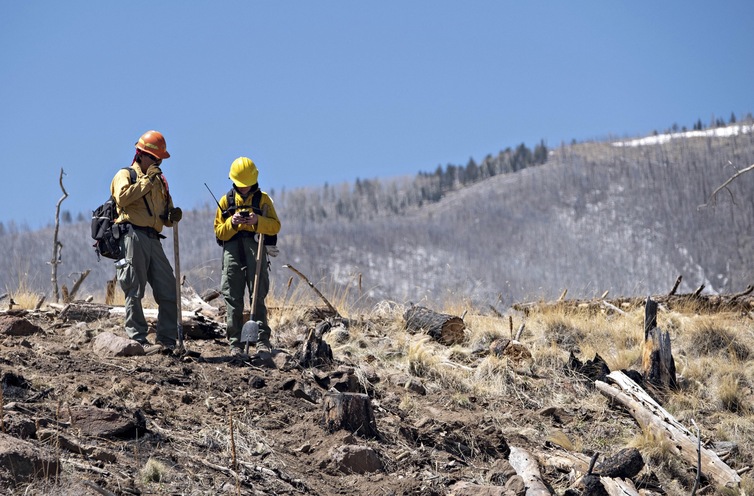A pair of Resource Advisors from the Coconino National Forest record data in Division Alpha as they...