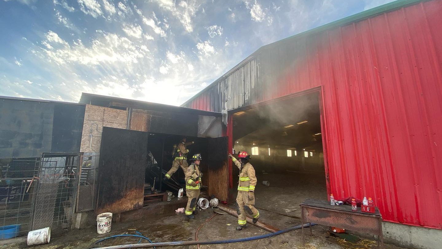 Firefighters at a barn after extinguishing a Provo fire....