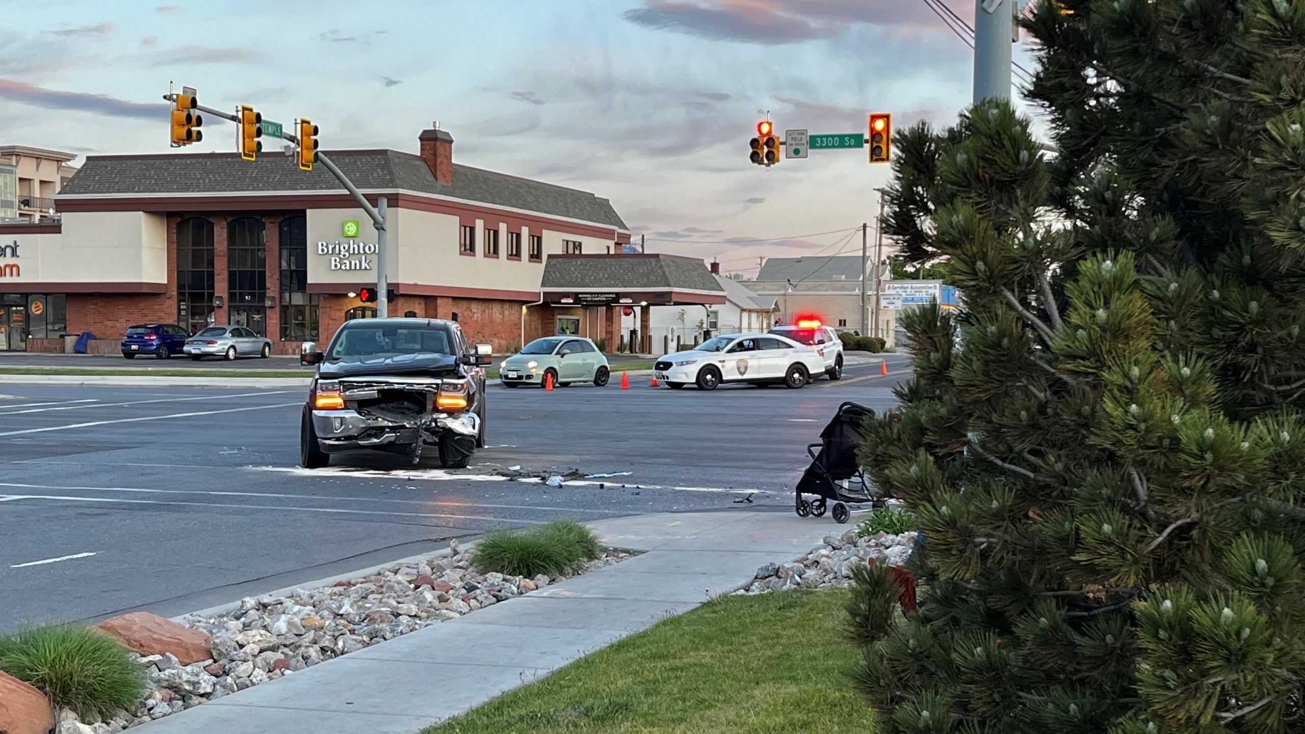 A crash between two vehicles at the intersection of 3300 South West Temple left three pedestrians i...