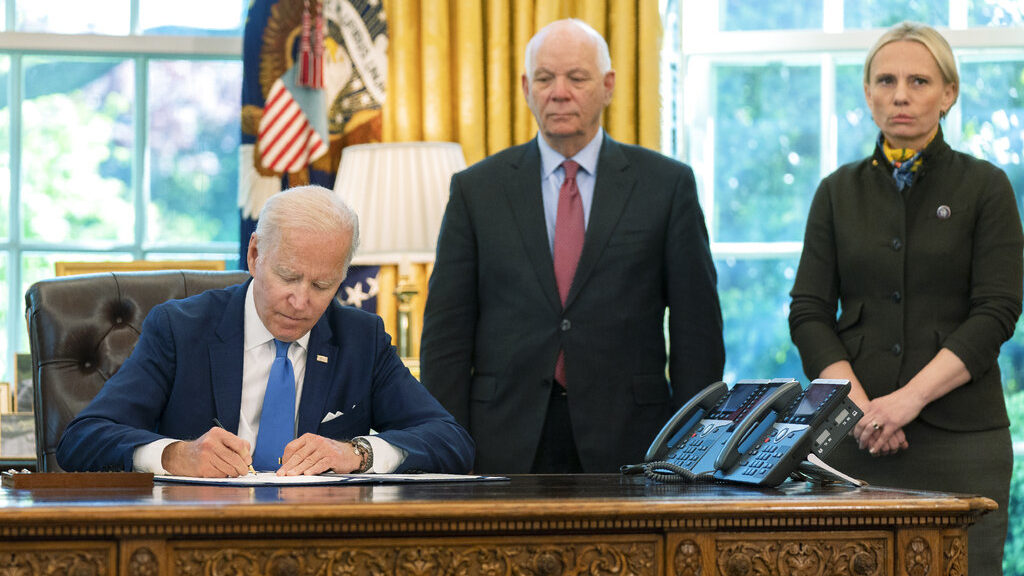 President Joe Biden signs the Ukraine Democracy Defense Lend-Lease Act of 2022 in the Oval Office o...
