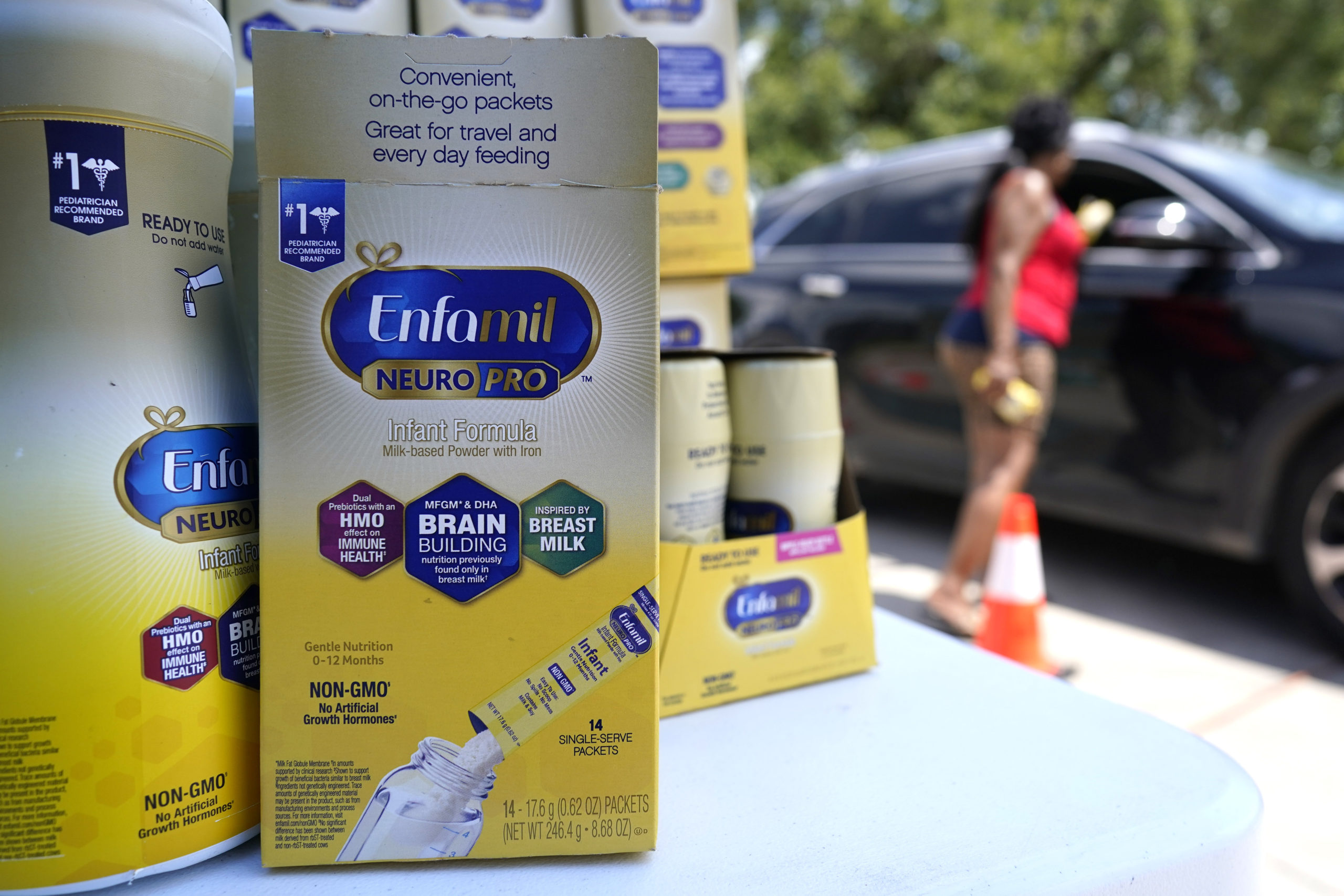 Katherine Gibson-Haynes helps distribute infant formula during a baby formula drive Saturday, May 1...