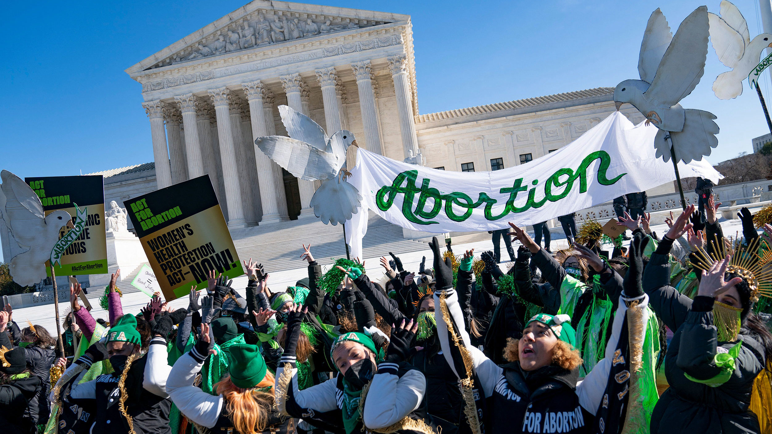 TOPSHOT - Pro-choice activists participate in a "flash-mob" demonstration outside of the US Supreme...