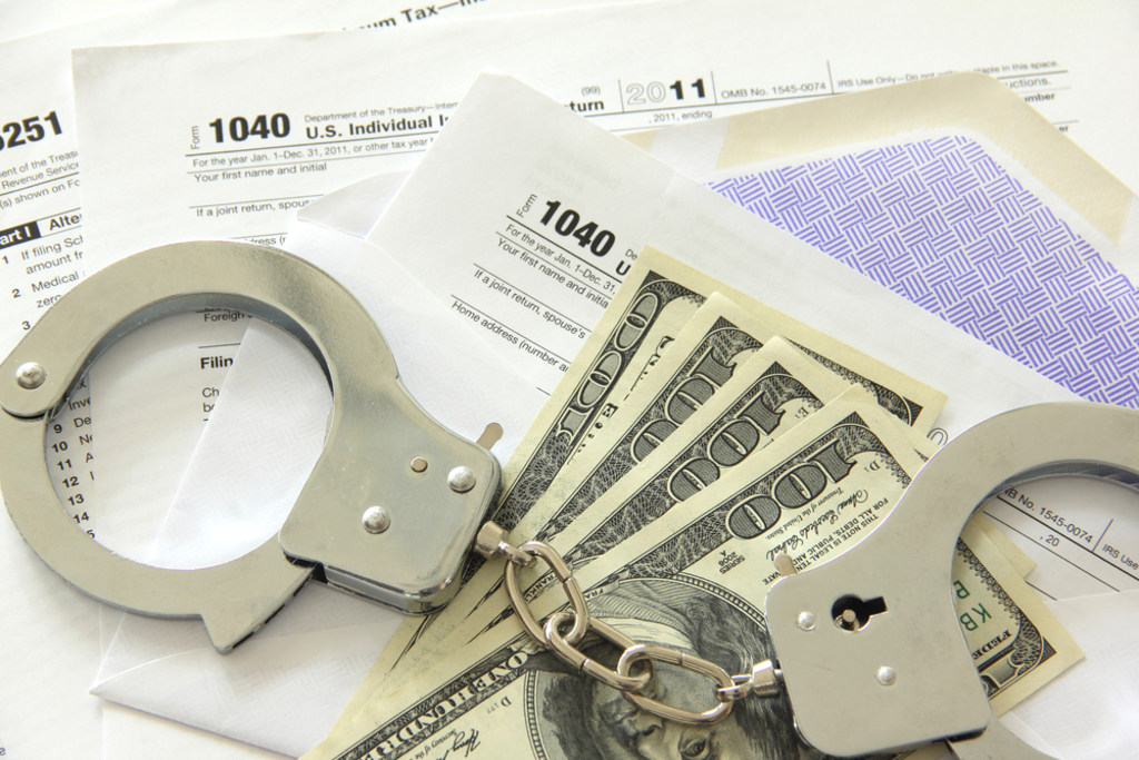 Woman scams people out of $50,000 in tax returns....