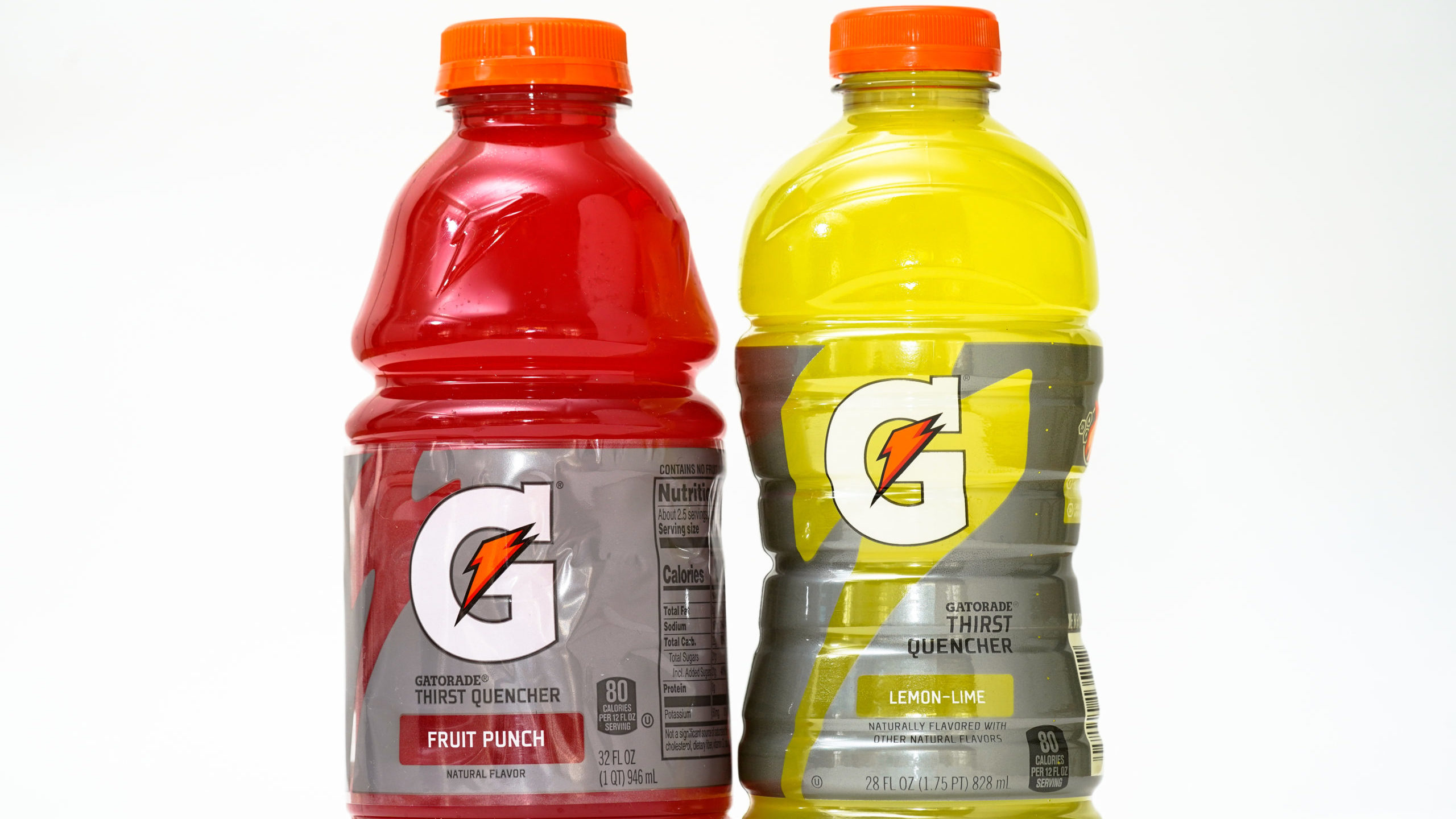 Two sports drink, one red one yellow...