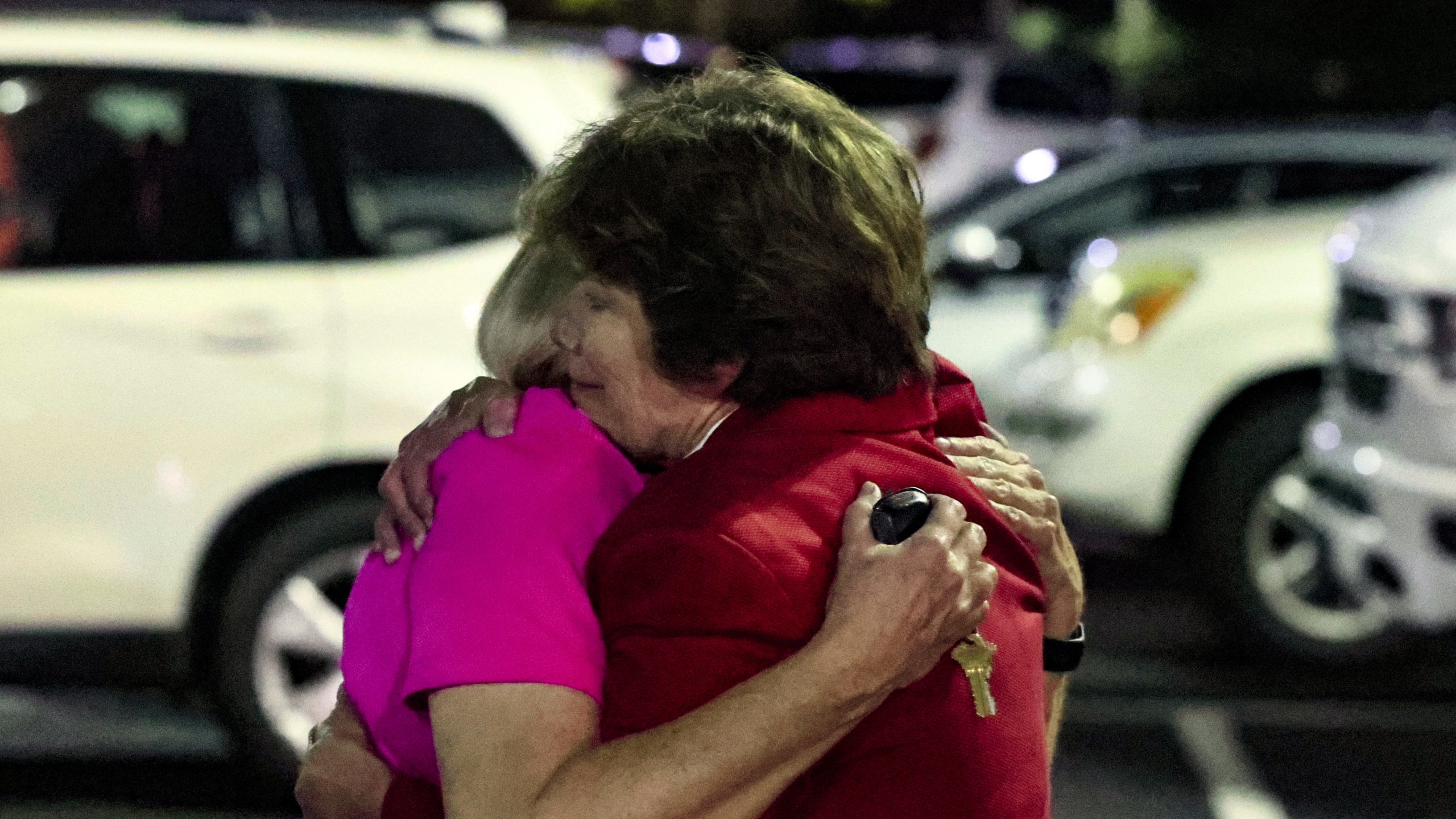 Church members console each other after a shooting at the Saint Stephen’s Episcopal Church on Thu...