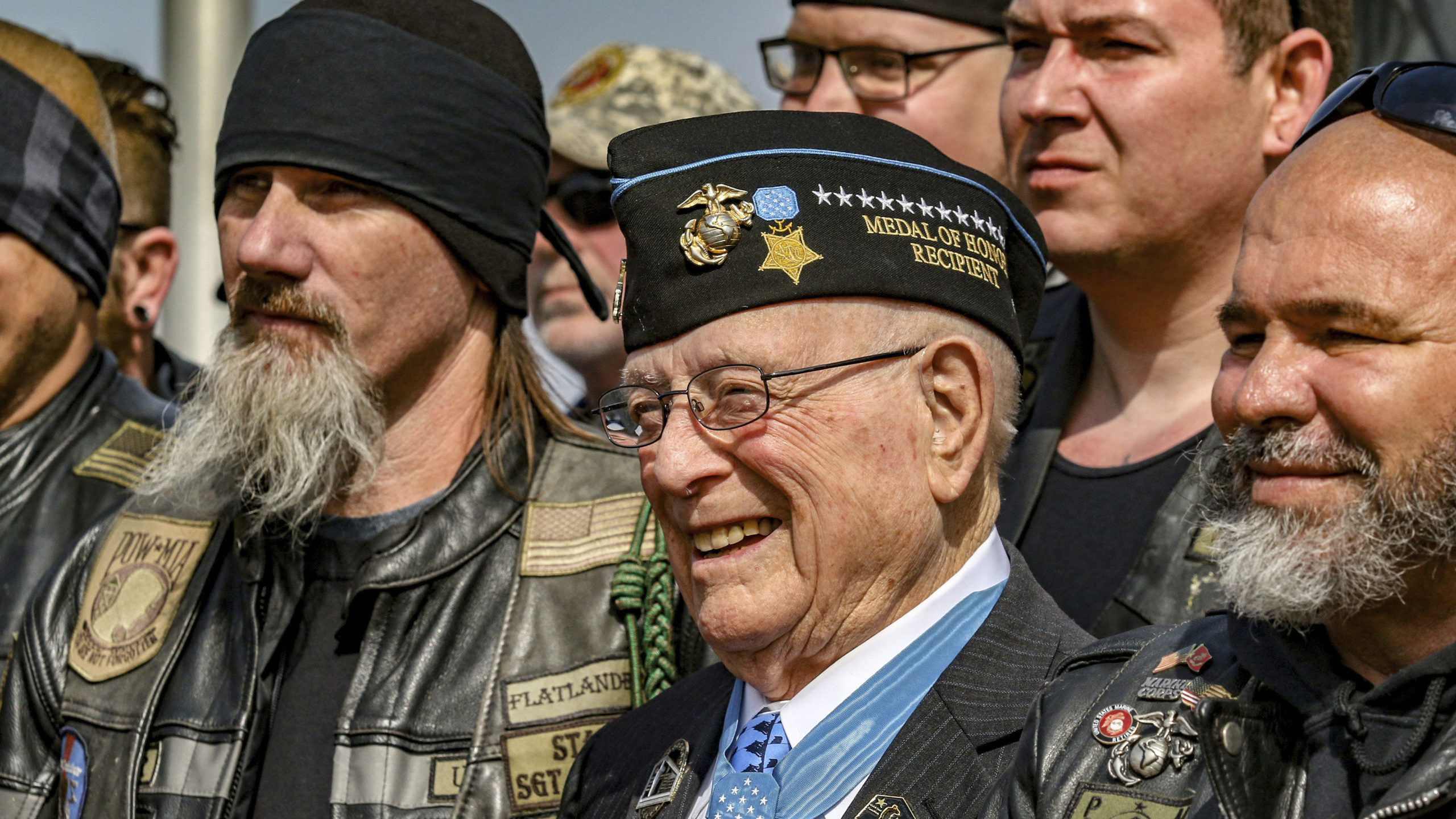 FILE - Hershel "Woody" Williams, center, the sole surviving U.S. Marine to be awarded the Medal of ...