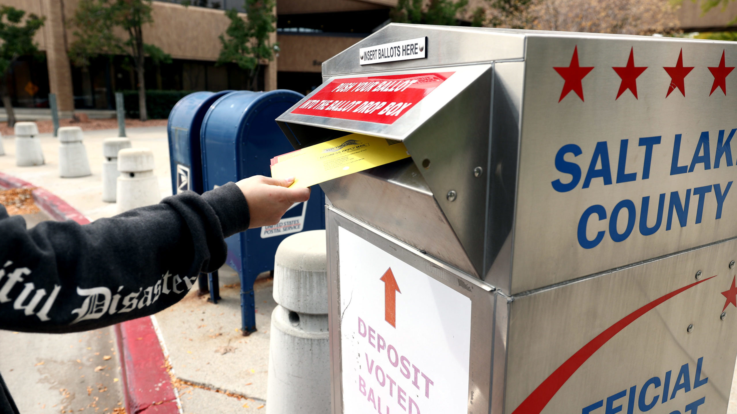 Image of a ballot drop box , officials say voting scams can look legit...