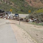 Semi-truck transporting over 200 beehives rolls over on I-80