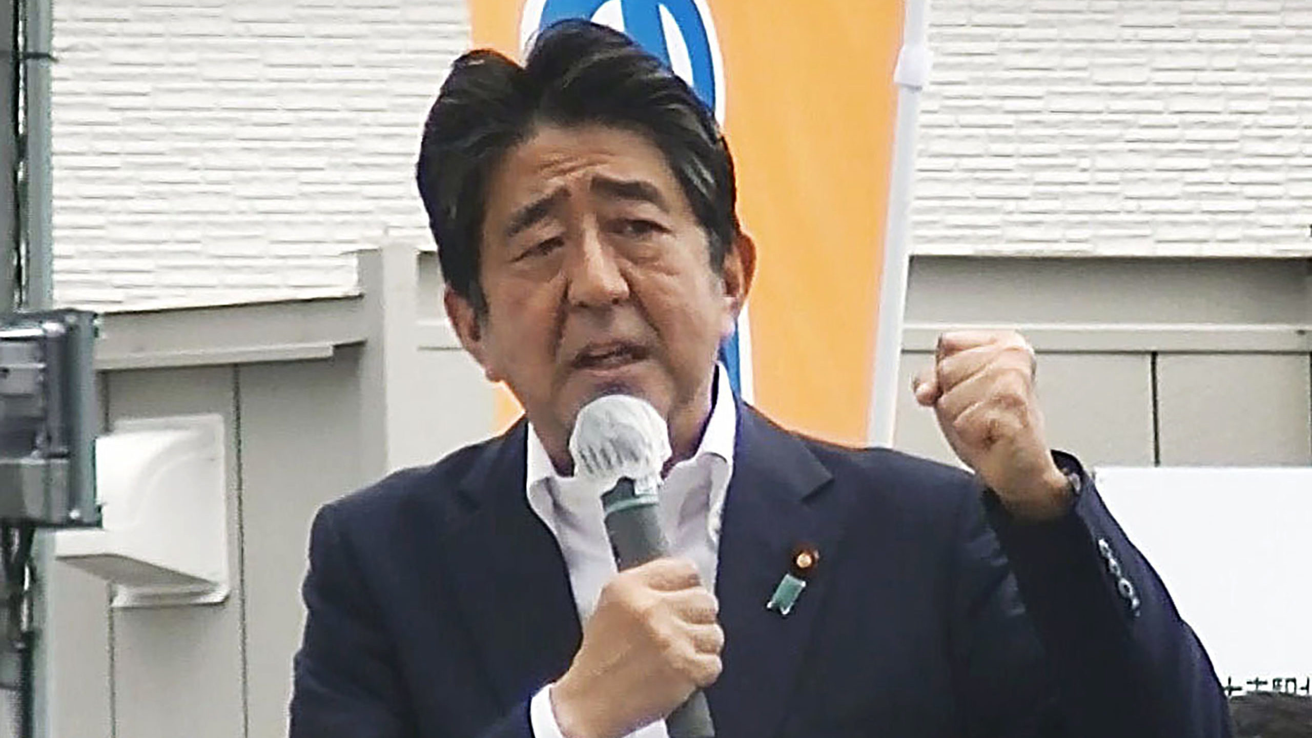 In this image from a video, Japan’s former Prime Minister Shinzo Abe makes a campaign speech in N...