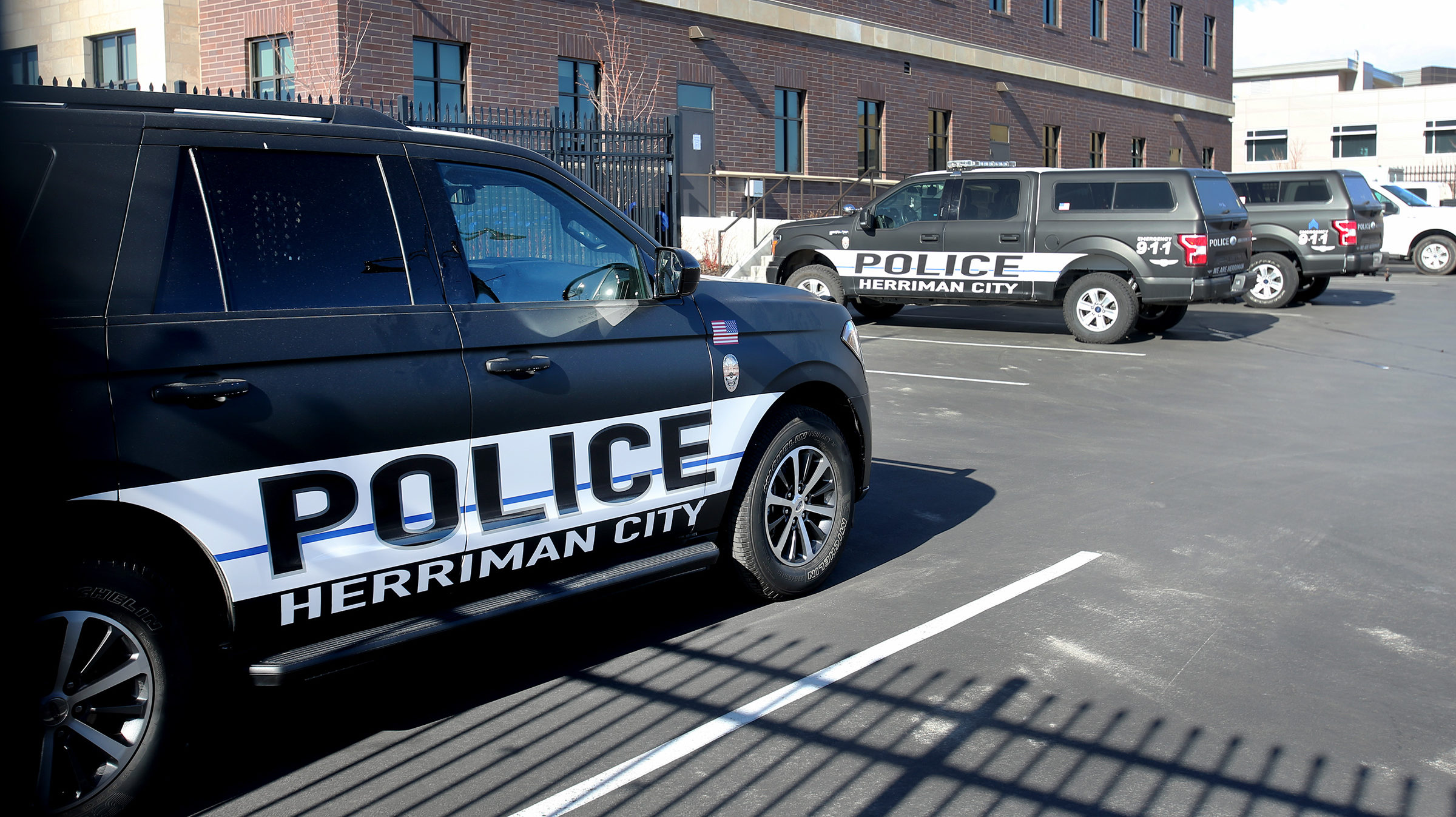 Herriman City PD cars are pictured....