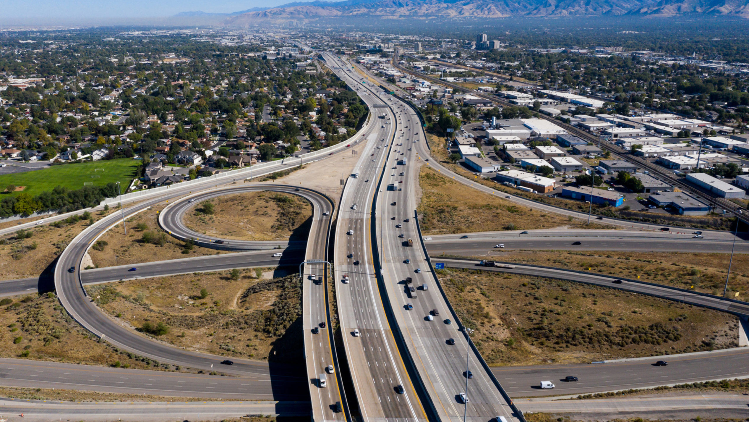 Cars drive through the I-15 and I-215 interchange. The Cottonwood heights 1-215 bridge will close t...