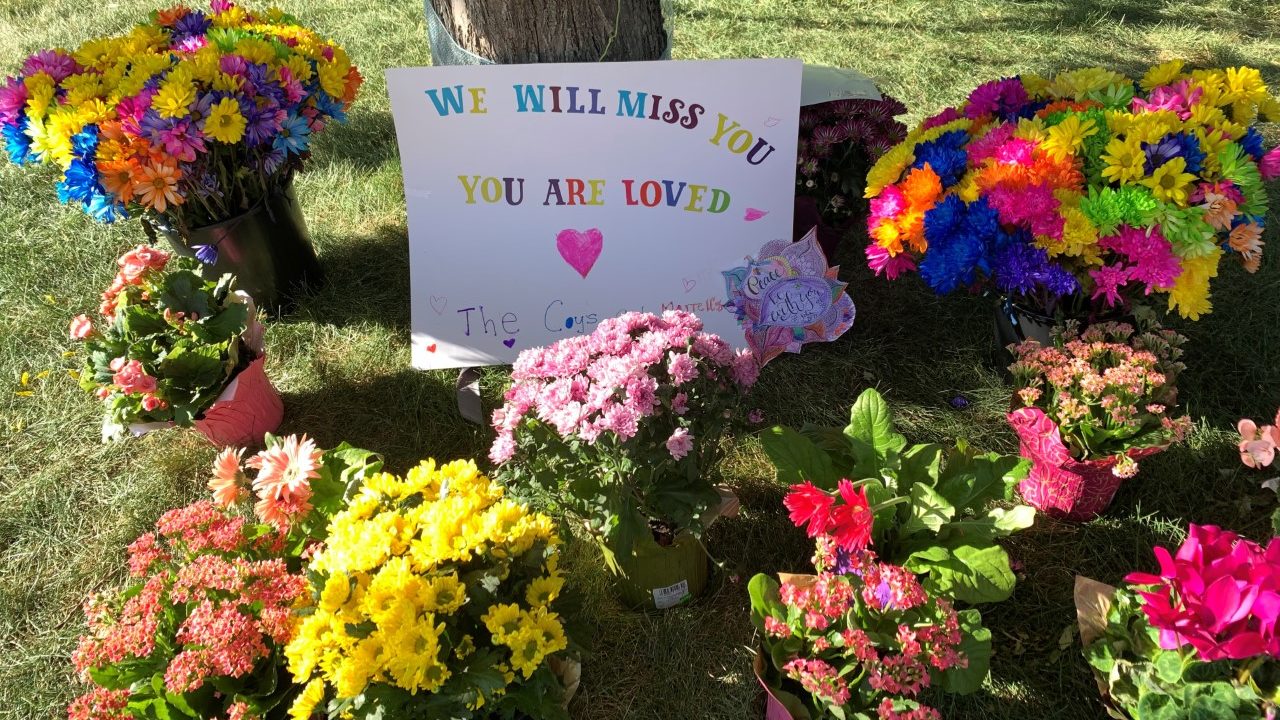 The community built a small memorial in front of Macie Hill's  family home. Hill passed away after ...