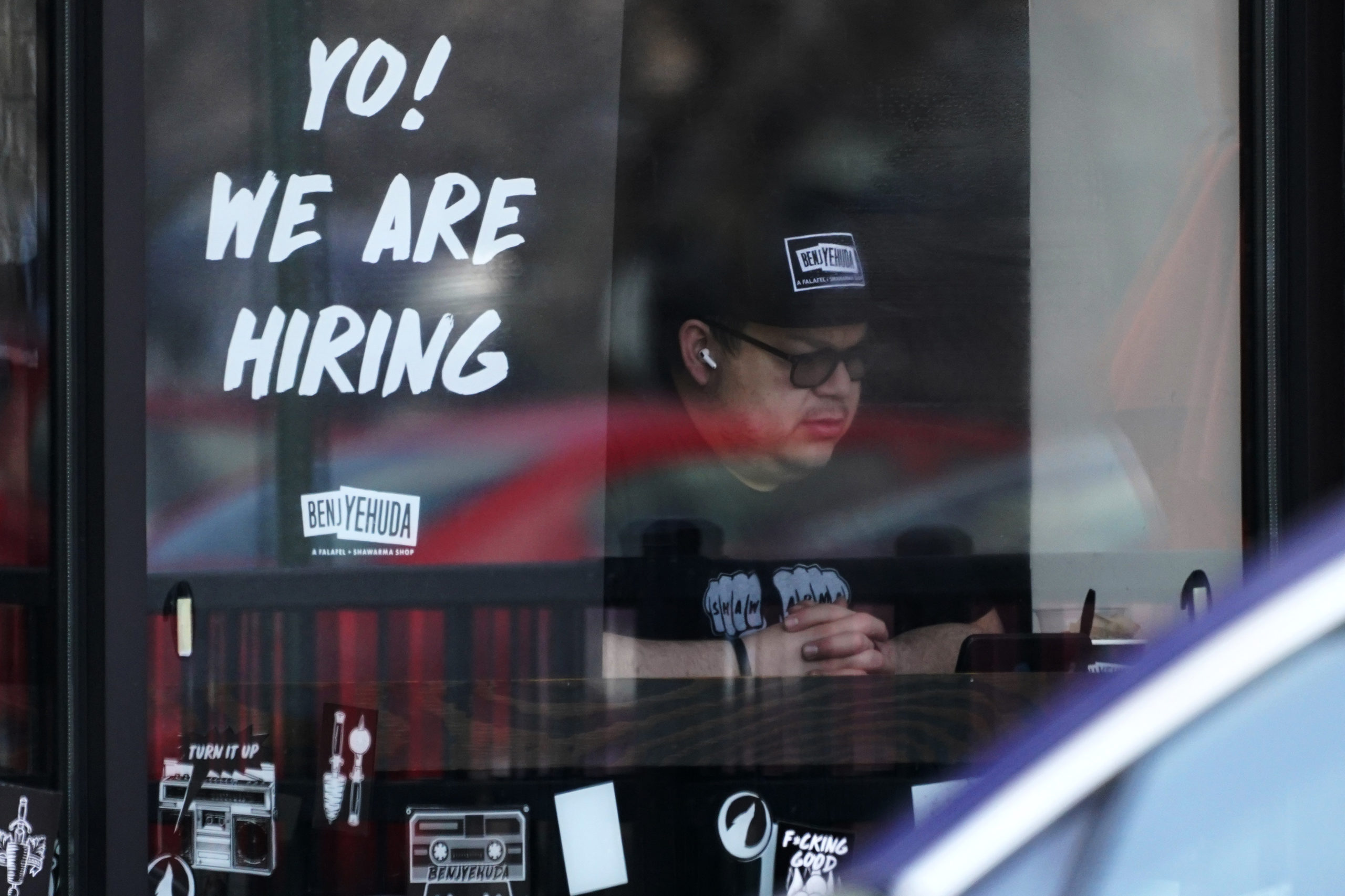 FILE - A hiring sign is displayed at a restaurant in Schaumburg, Ill., Friday, April 1, 2022.  More...