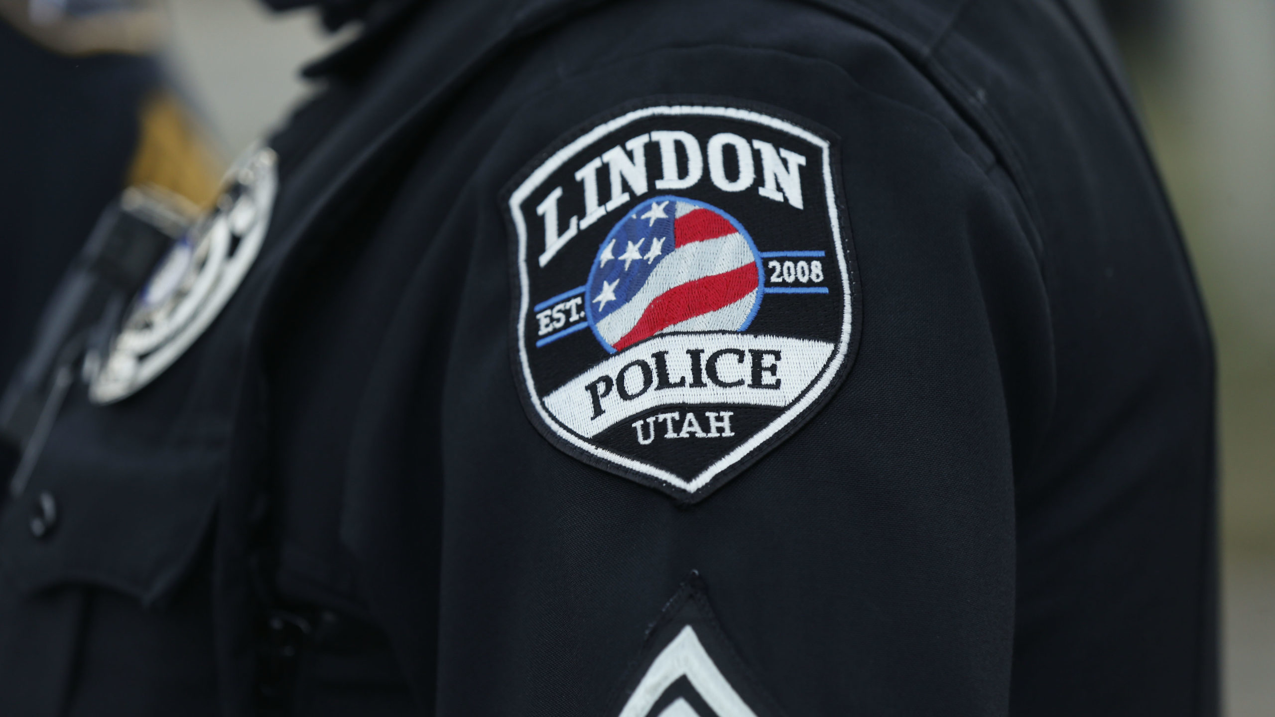 Lindon police officer in uniform. They are investigation the death of a Lindon 16-year-old...