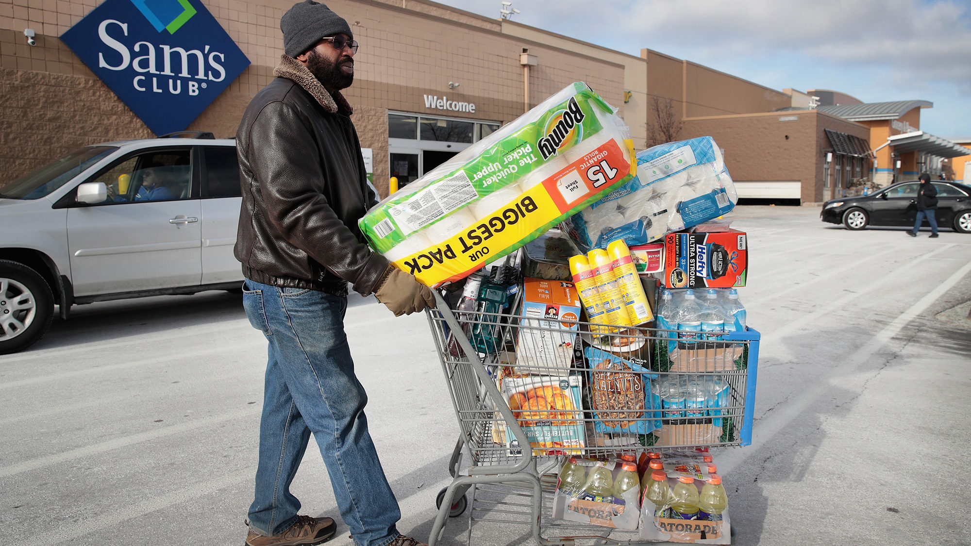 A shopper stocks up on merchandise at a Sam's Club store on Jan. 12, 2018 in Streamwood, Illinois. ...