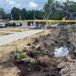 Man steals excavator and starts ripping up the ground, breaks water line