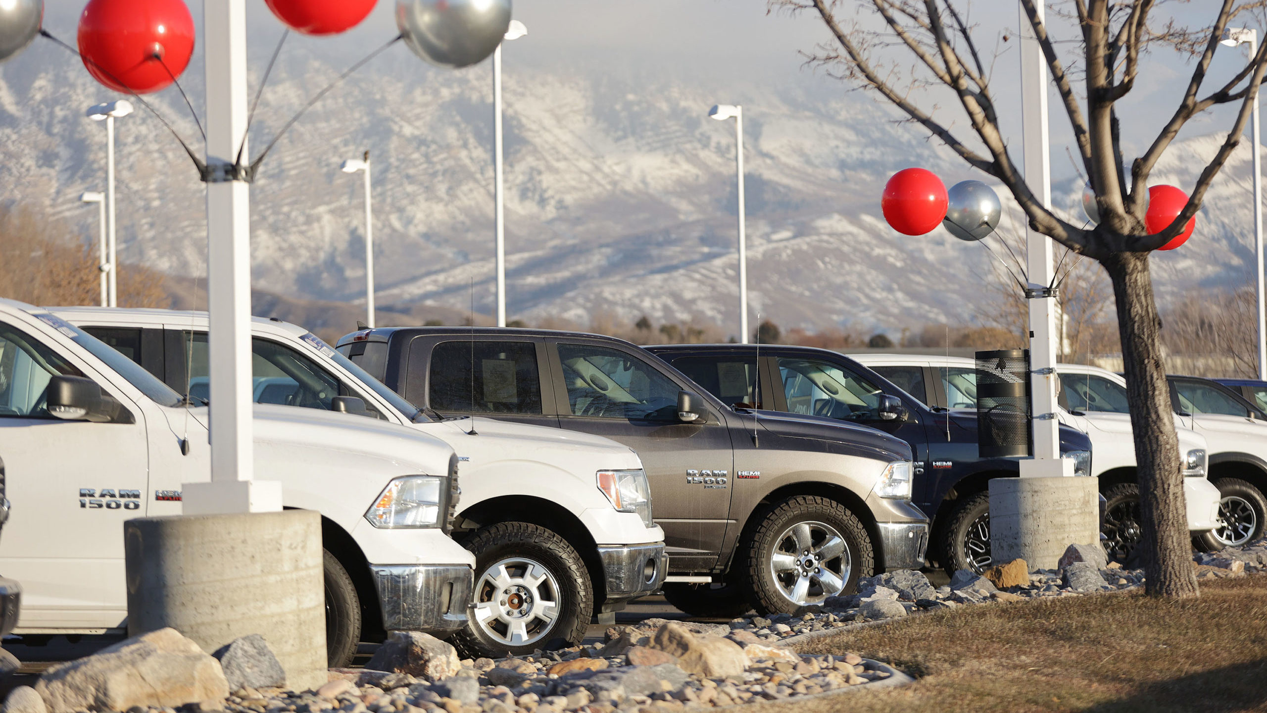 Trucks are lined up for sale at Low Book Sales in Lindon on Thursday, Feb. 3, 2022. Most new vehicl...